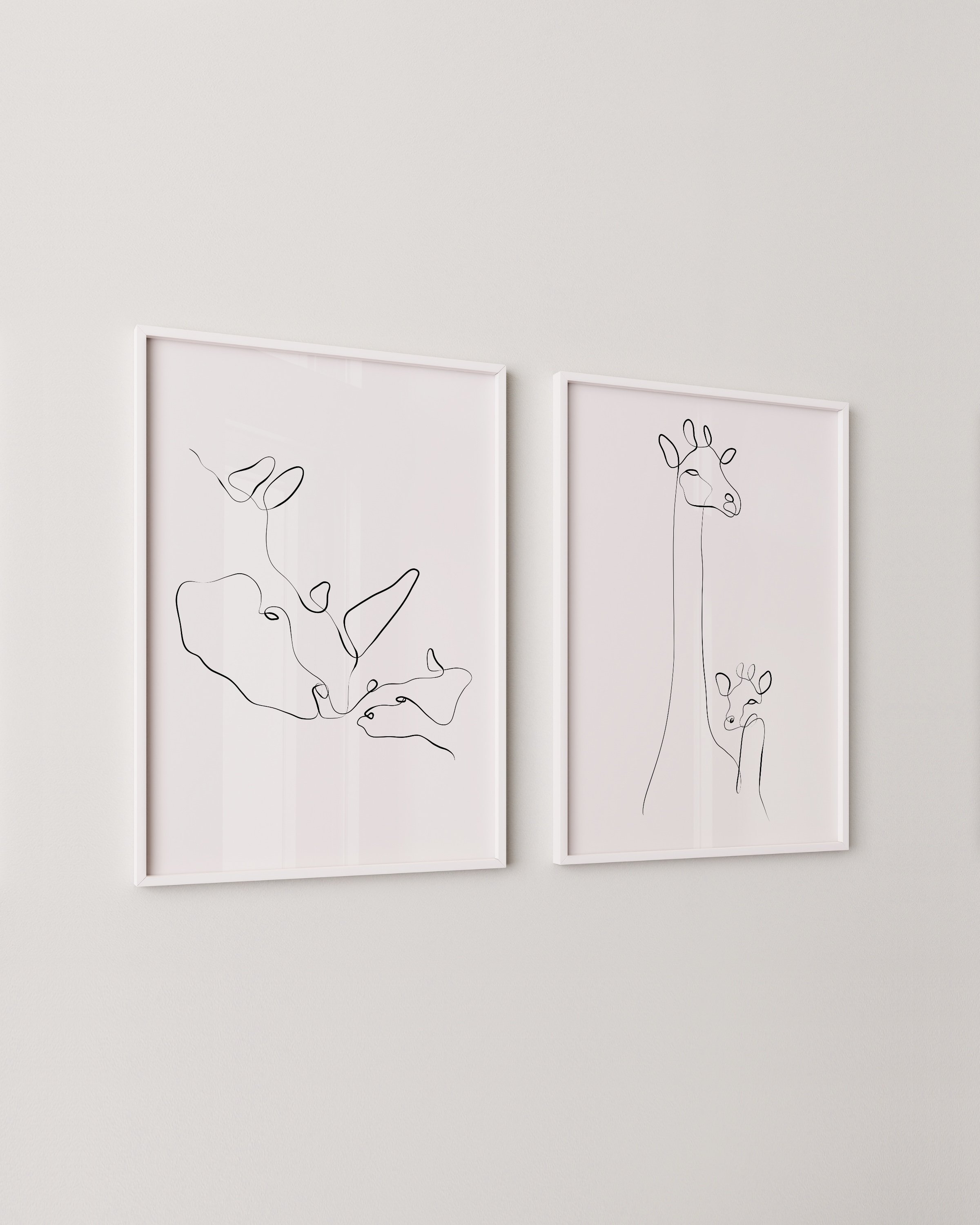 Minimalist line art of giraffe and rhino, designed for kids’ room decor, adding a touch of elegance and nature to the space.