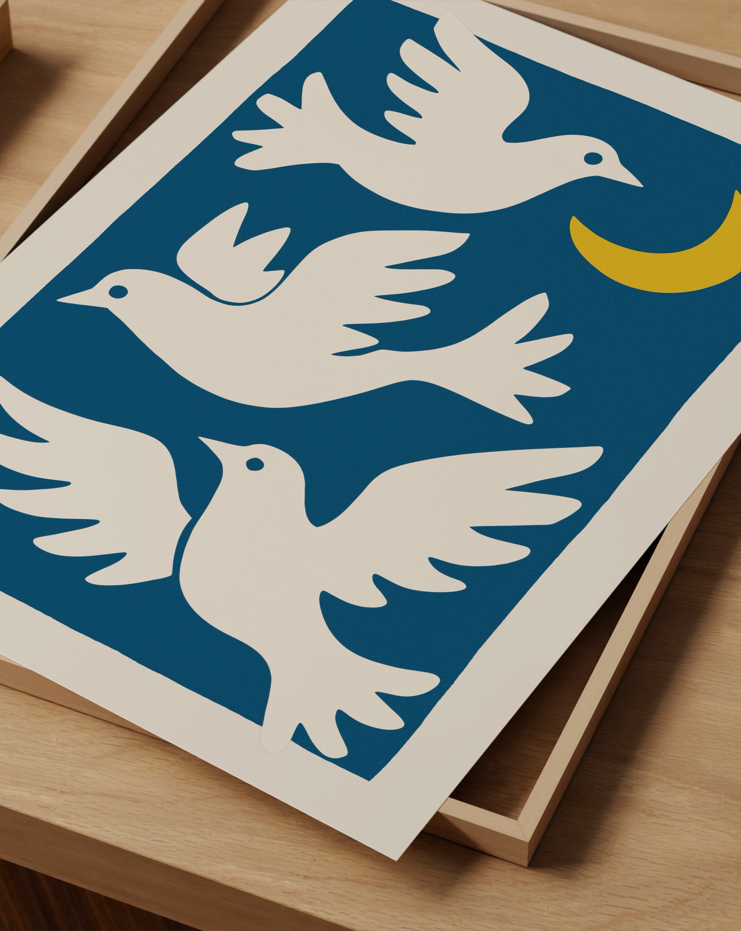 featuring three white doves flying around a yellow crescent moon on a bold blue background.