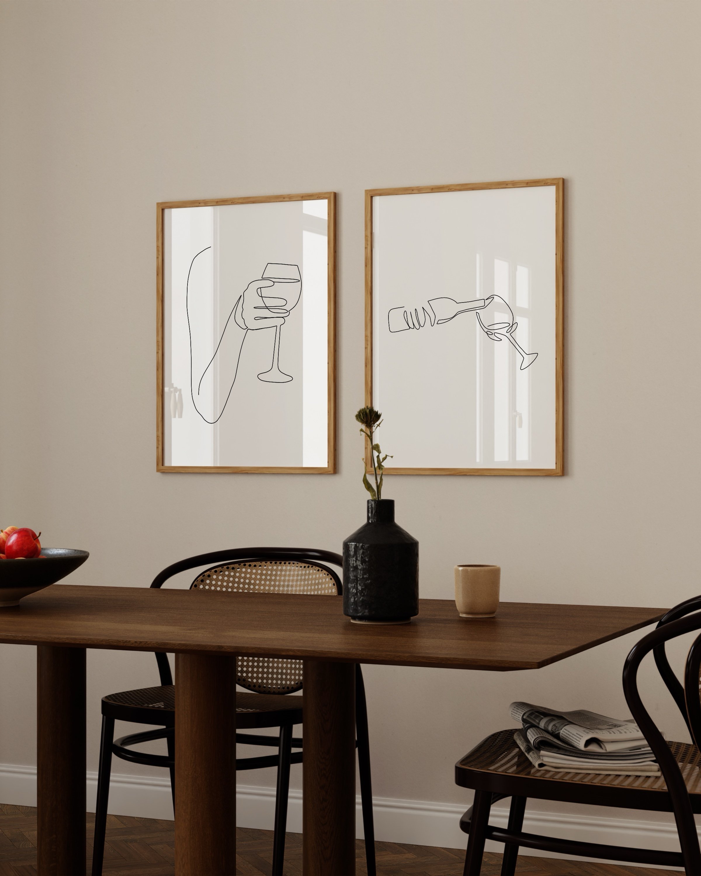 Minimalist wine art set with line drawings of a hand holding a wine glass and pouring wine from a bottle, ideal for modern decor.