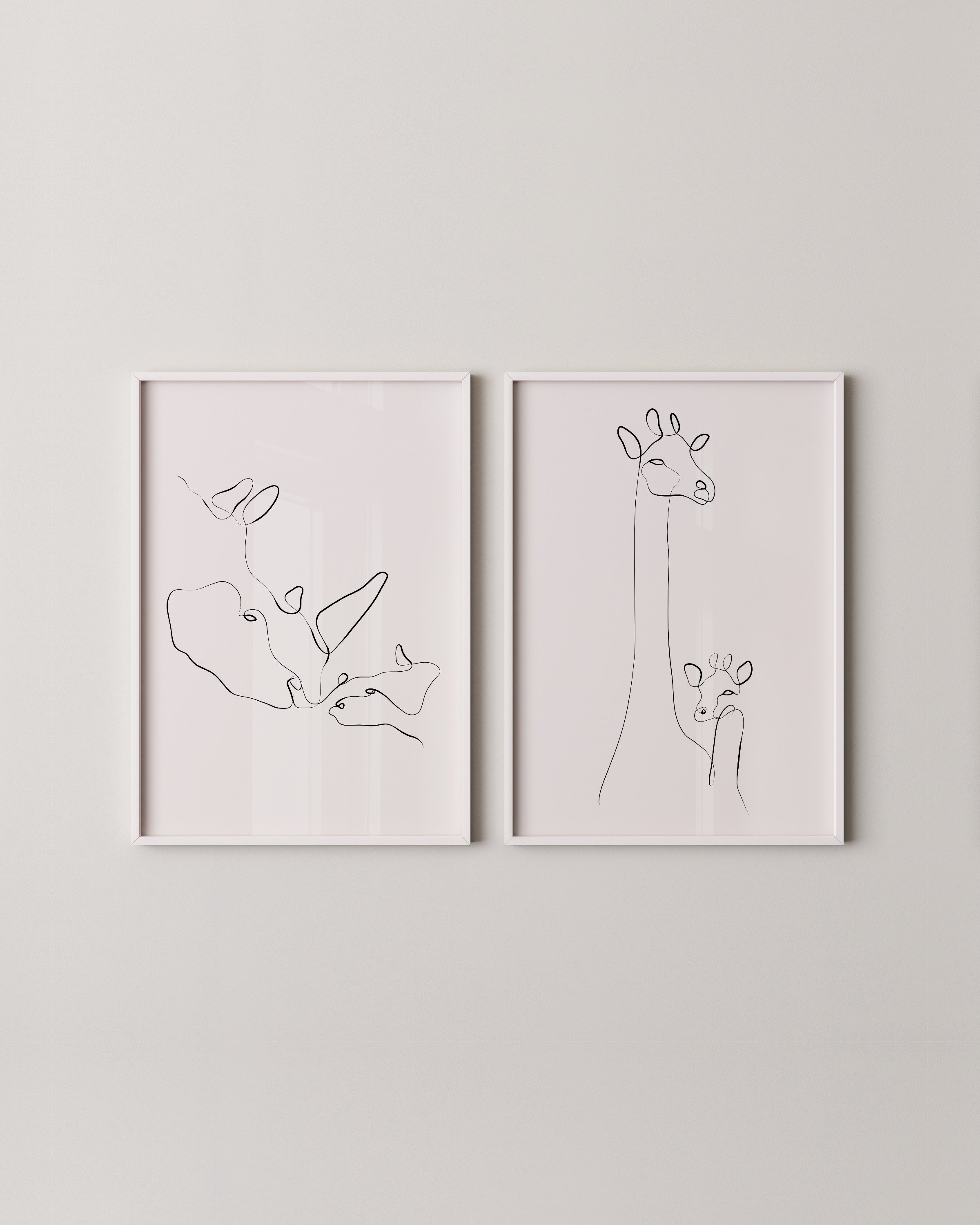 Minimalist line art of giraffe and rhino, designed for kids’ room decor, adding a touch of elegance and nature to the space.