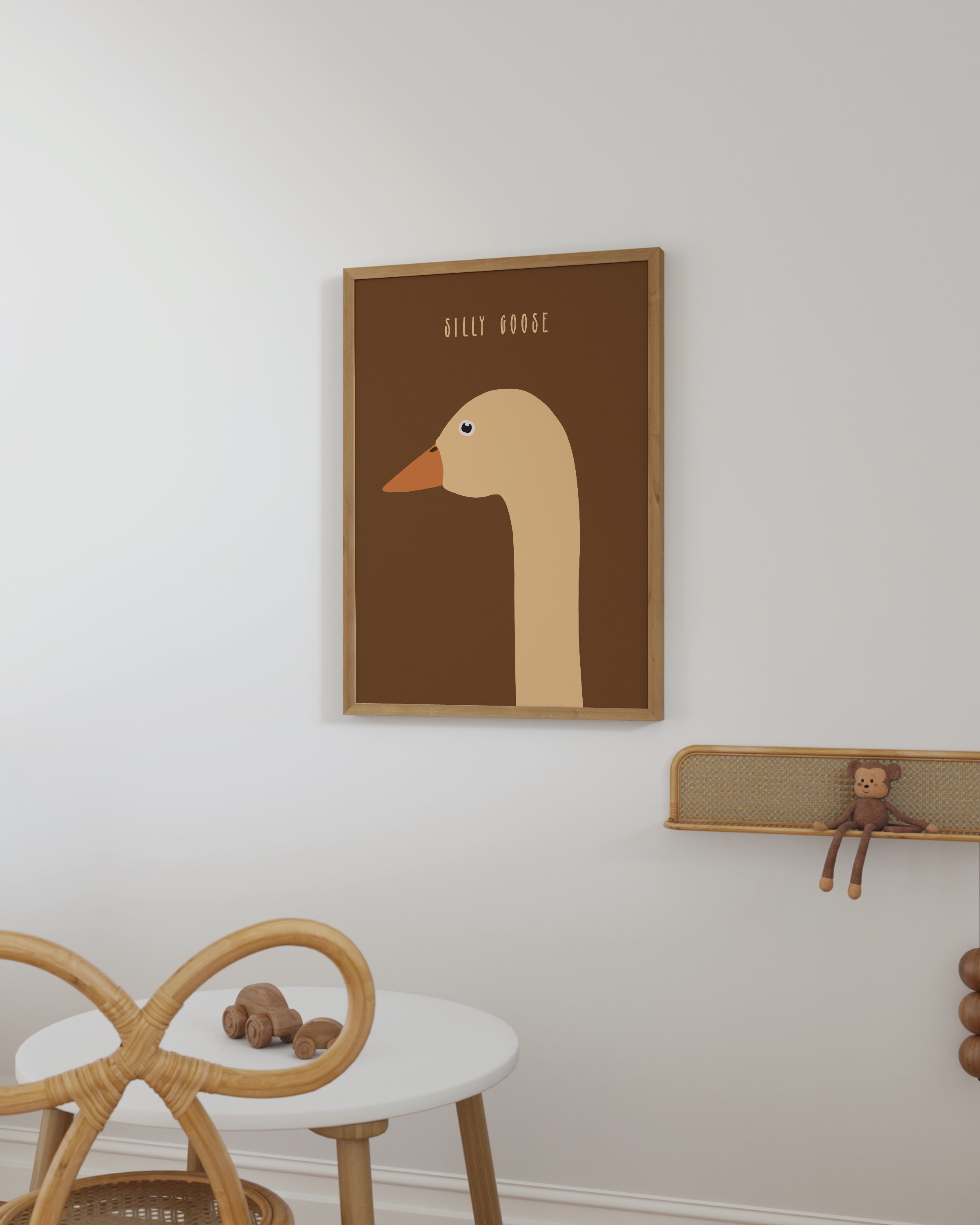 Minimalist art print of a goose with an orange beak and the text “Silly Goose” in a warm brown background, designed for kids’ rooms or playful spaces.