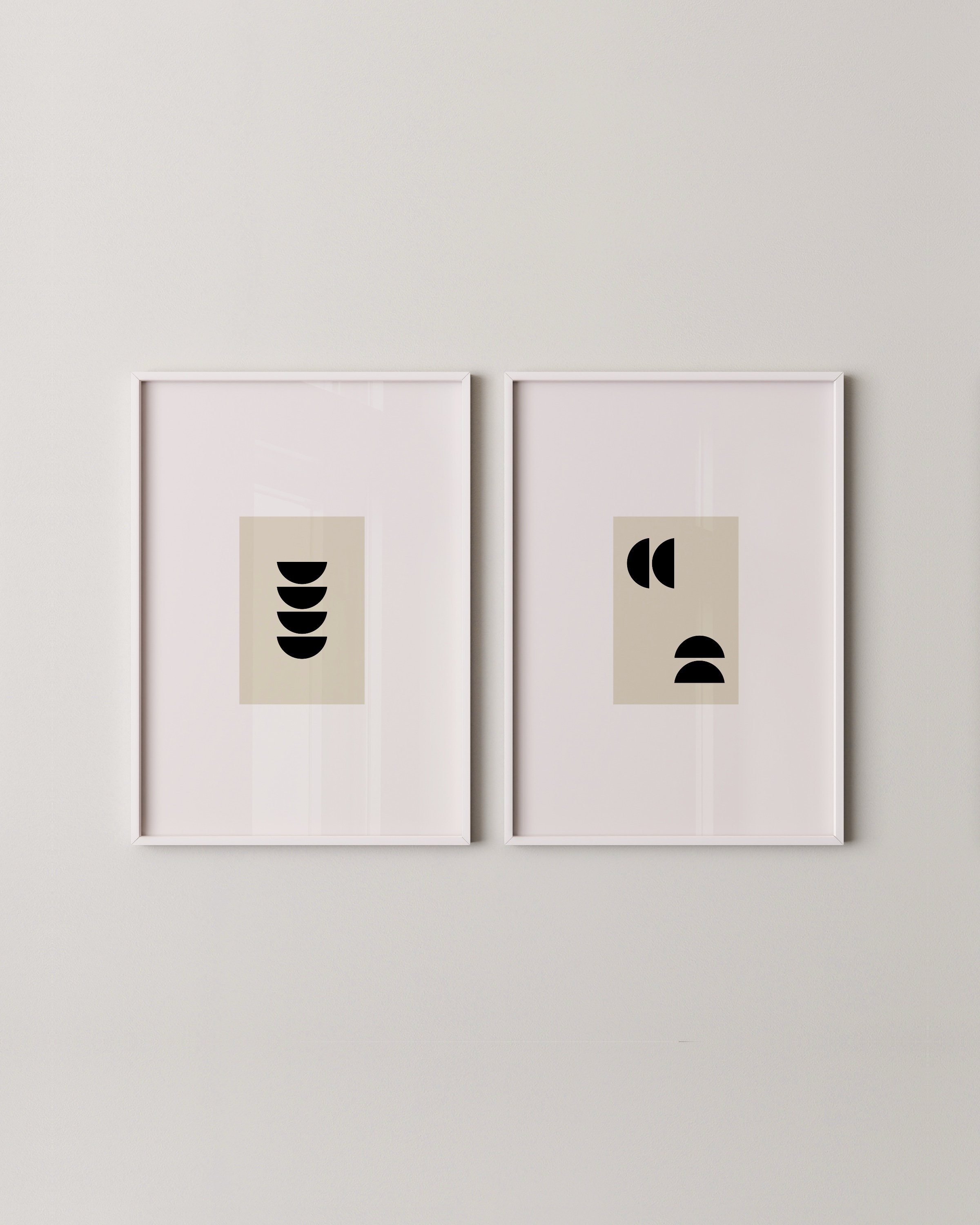 Pair of minimalist geometric prints, left print features a vertical stack of black half circles, right print shows scattered abstract shapes on beige backgrounds.