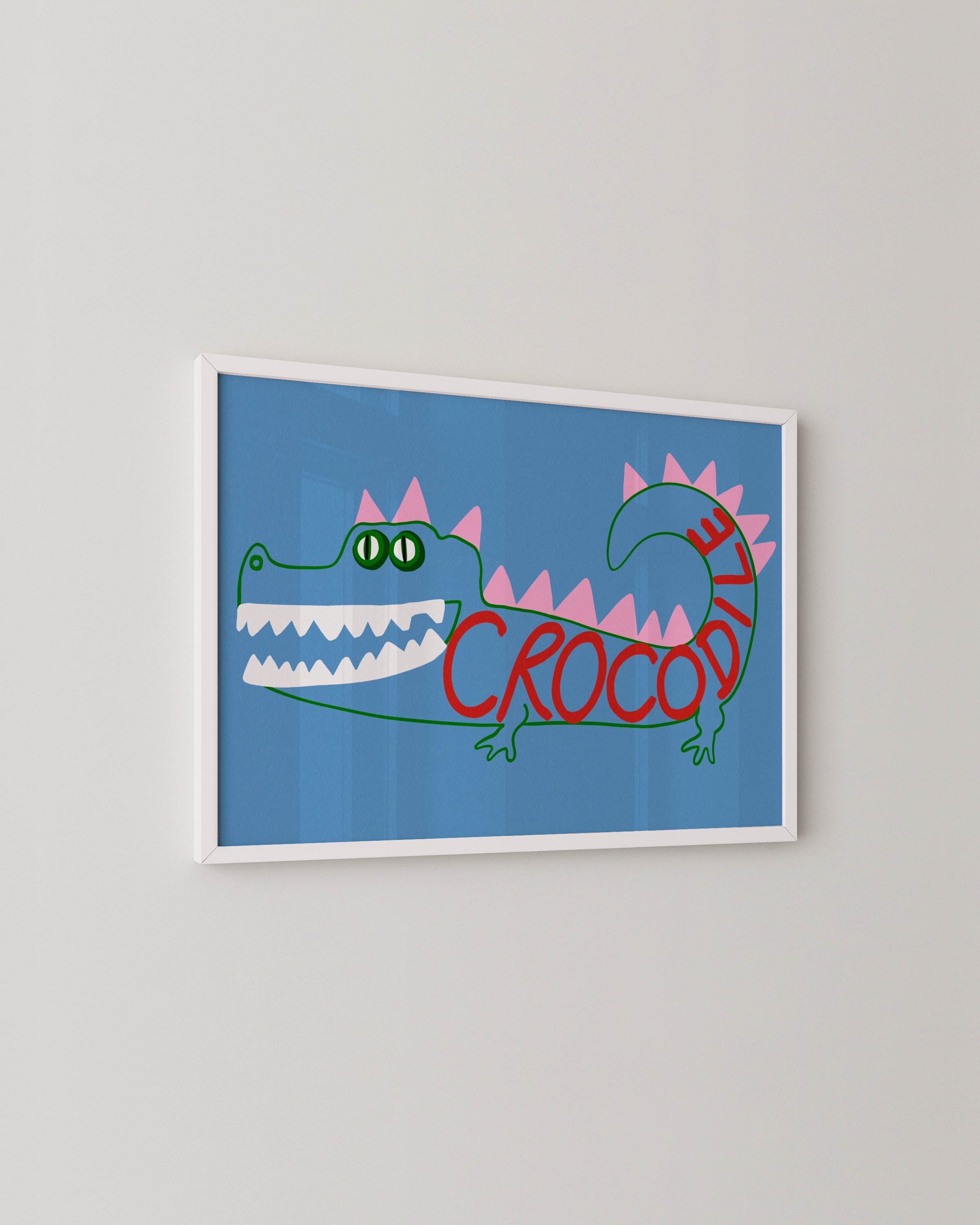 Playful crocodile art print with a blue background, featuring a colorful crocodile illustration with pink spikes and the word “Crocodile” in red.