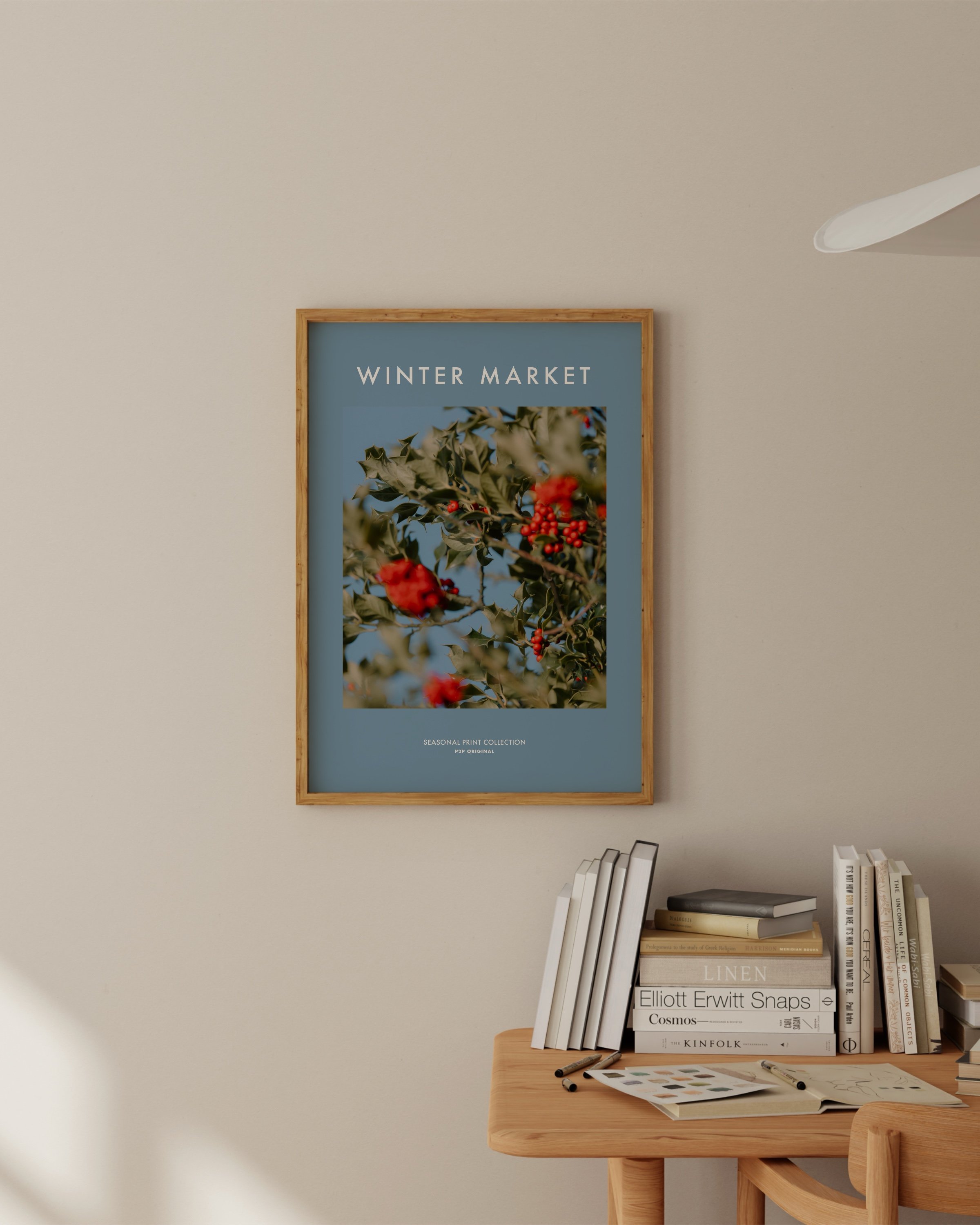 Winter Market seasonal printable wall art featuring a vibrant photo of holly berries with green leaves on a soft blue background.