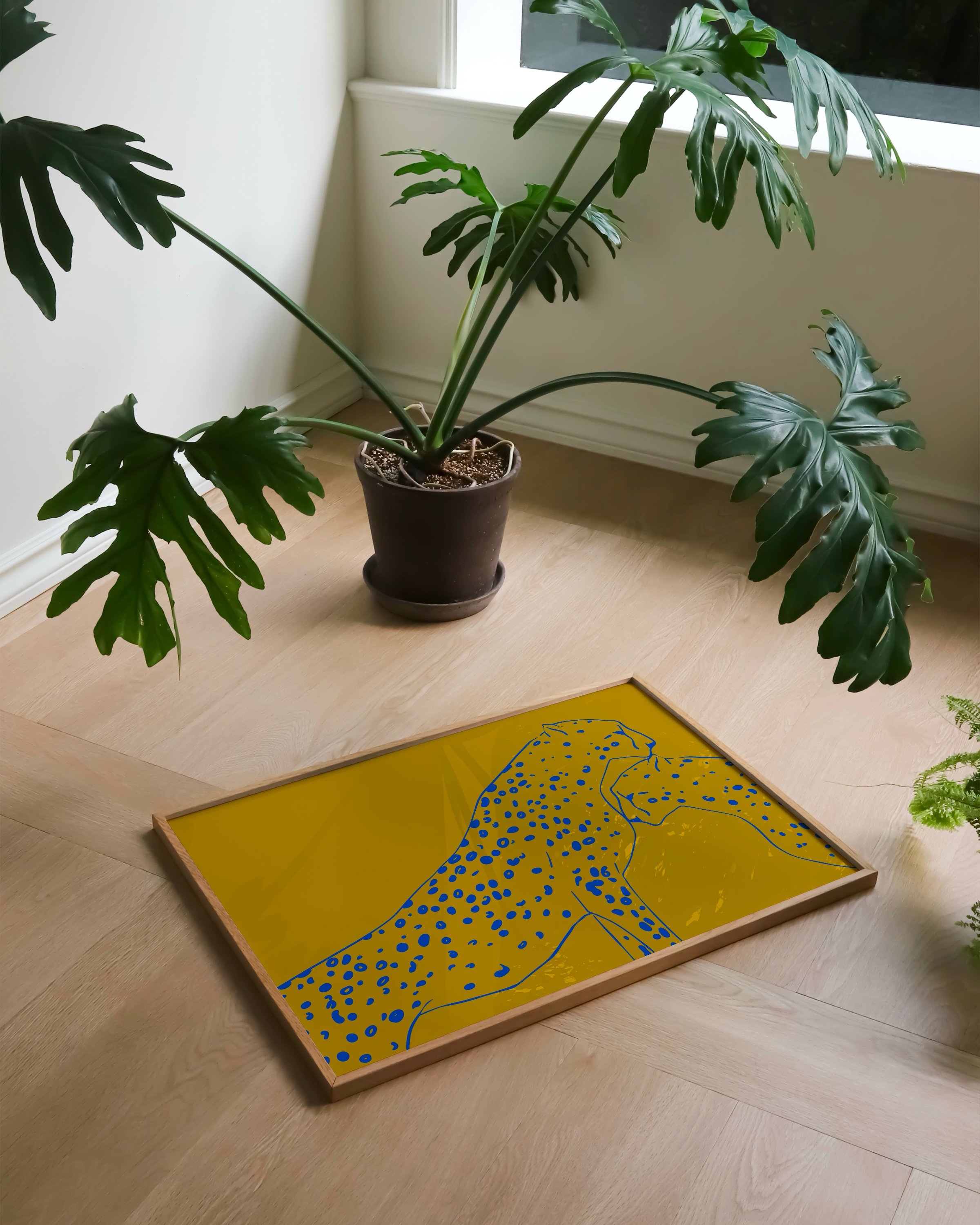 Modern cheetah wall art for kids in mustard yellow and cobalt blue, perfect for playful nursery or children’s room decor.