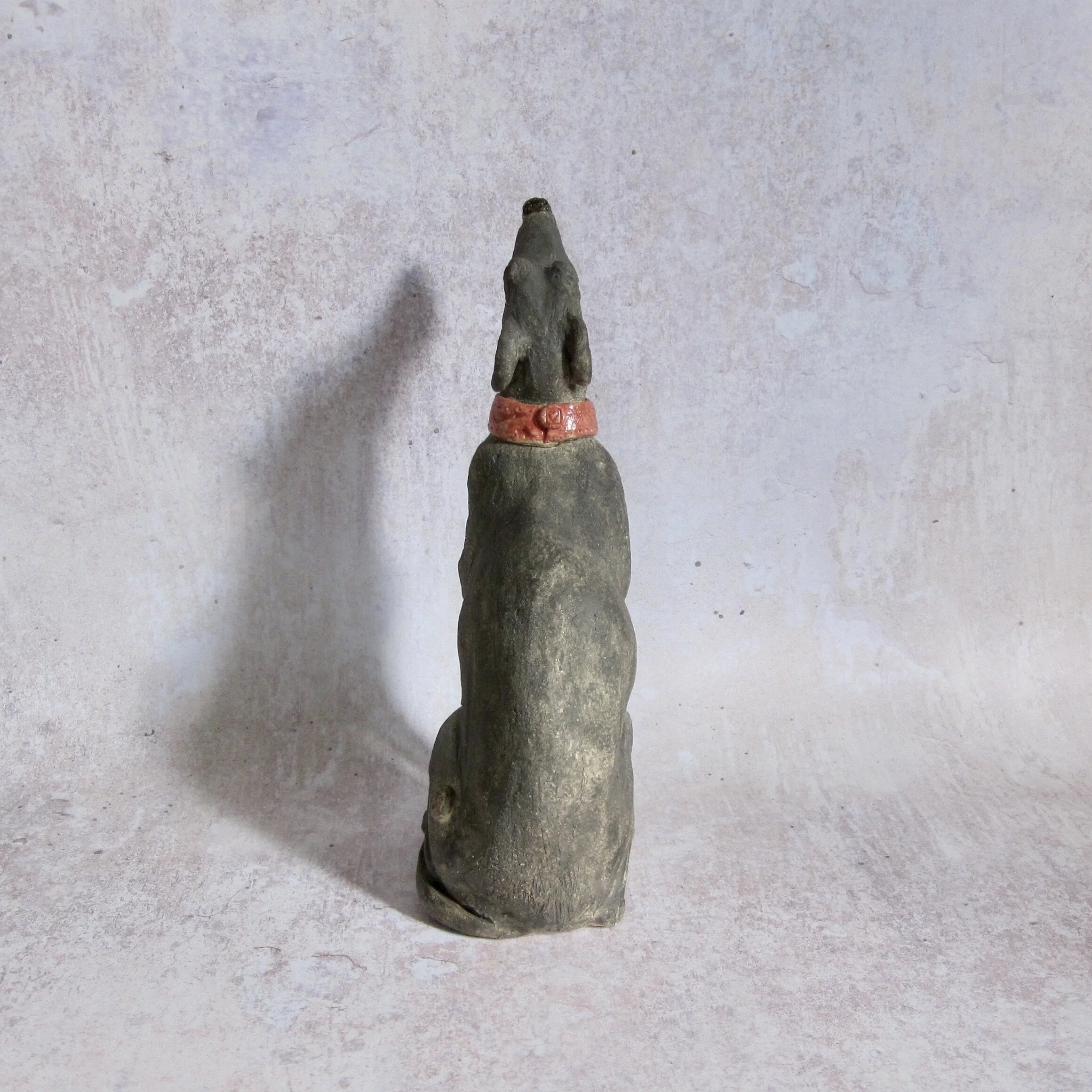 Individual hand sculpted, comical lurcher back view