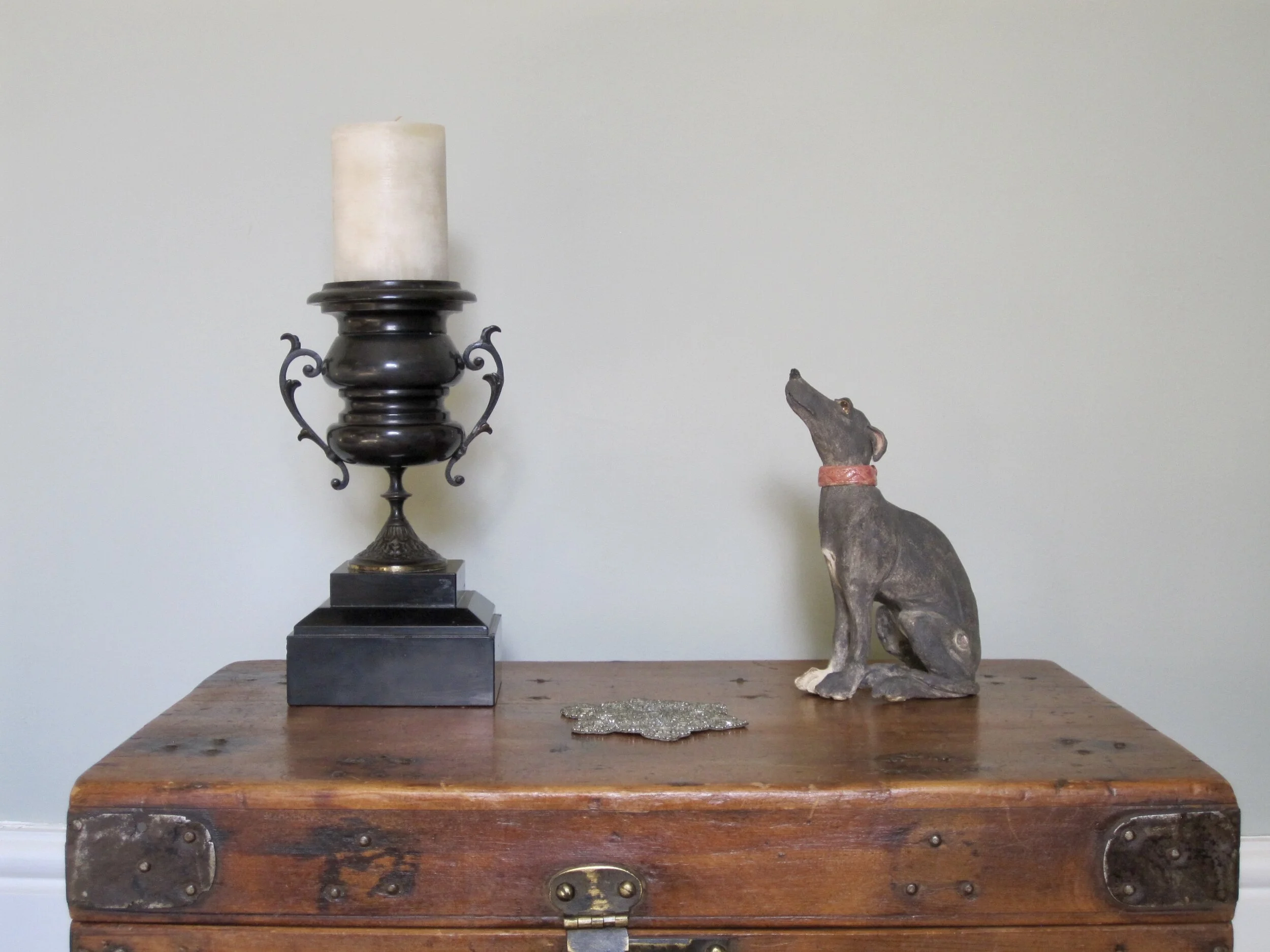 Individual hand sculpted, comical lurcher side view . Lifestyle picture