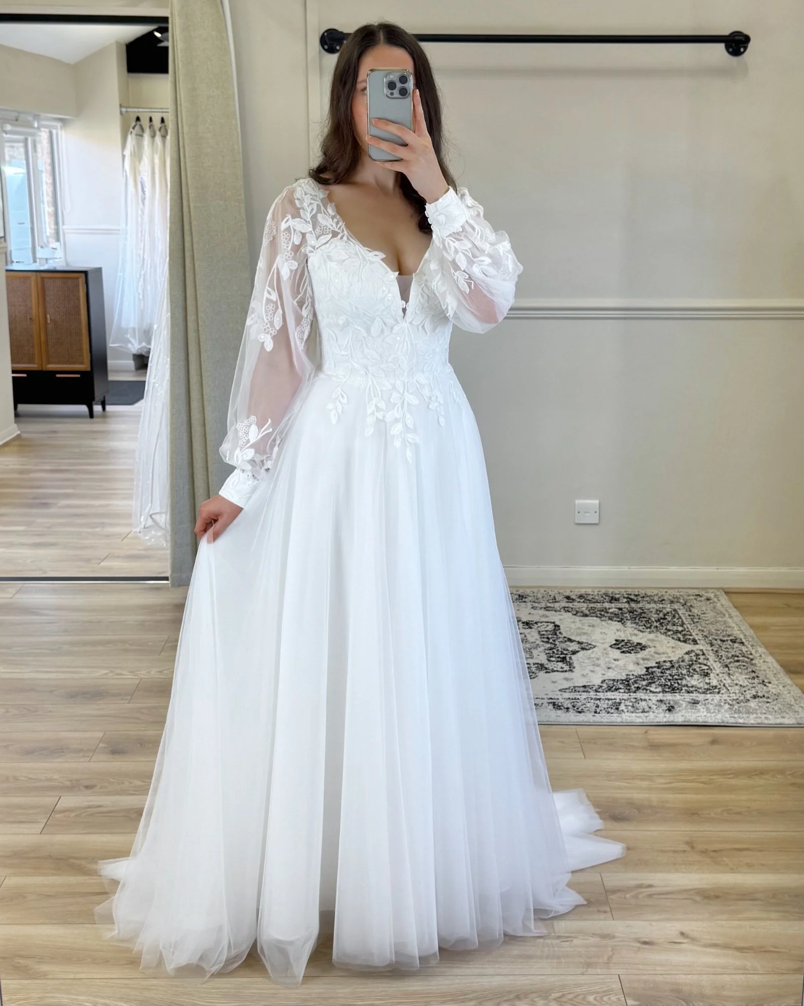 Sometimes simple is everything 💛 This soft tulle A-line with a plunge V-neckline and delicate leafy lace feels like a dream come true 🌿✨ Perfect for the bride who loves effortless elegance.

Styled with optional extra puff sleeves - swipe to see th