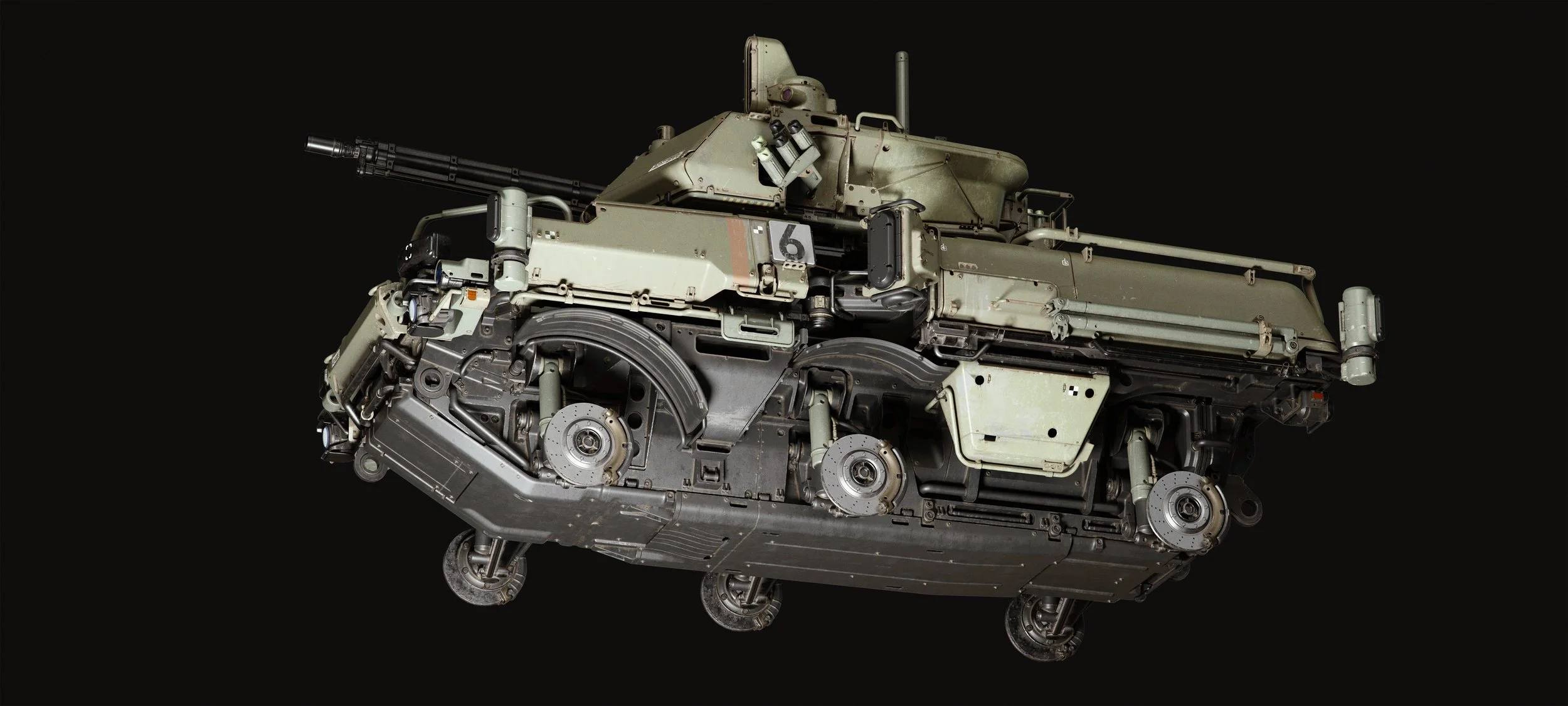 A military tank turret with a main gun and monitoring equipment, isolated on a black background.