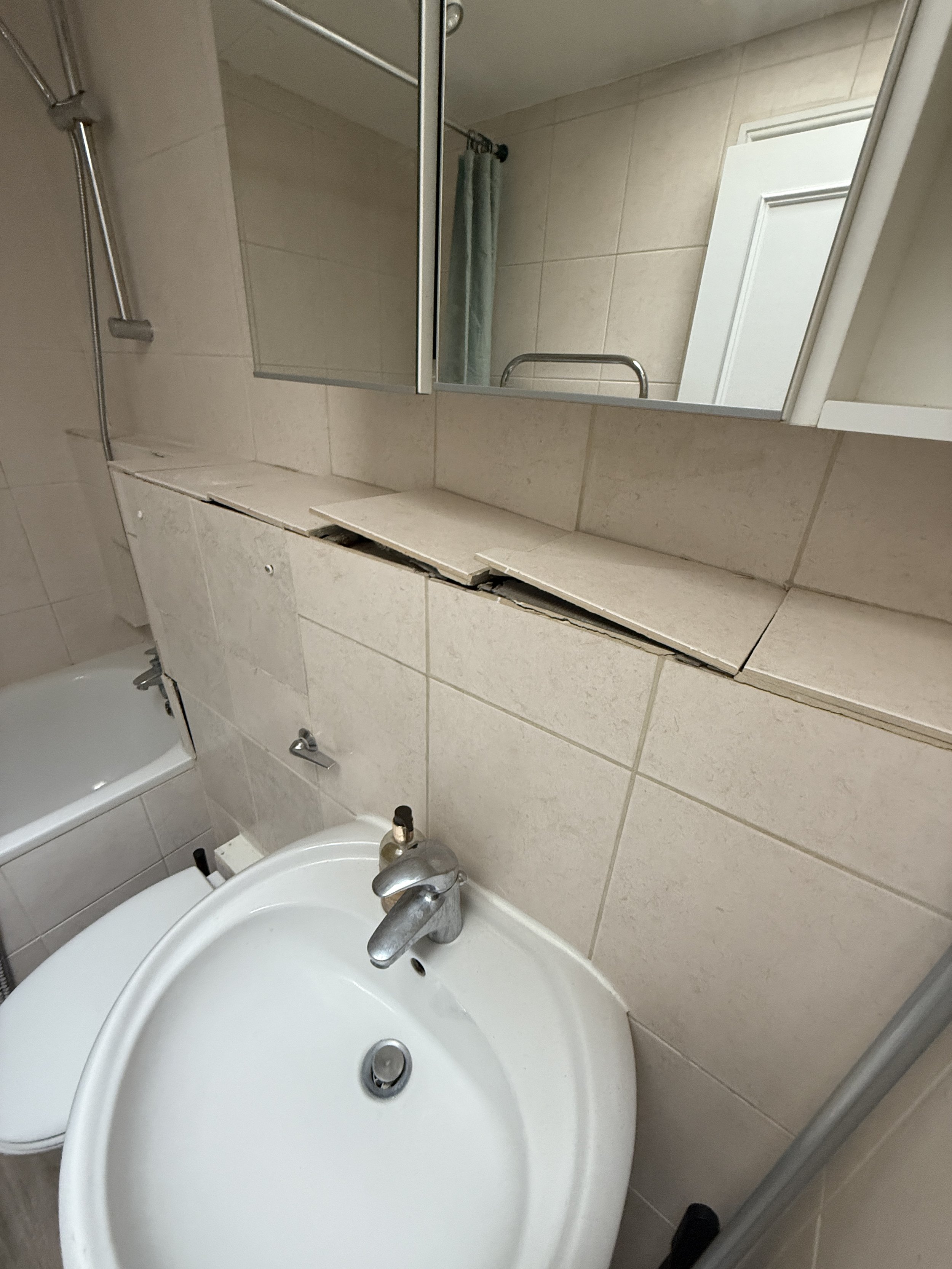 broken bathroom tiles