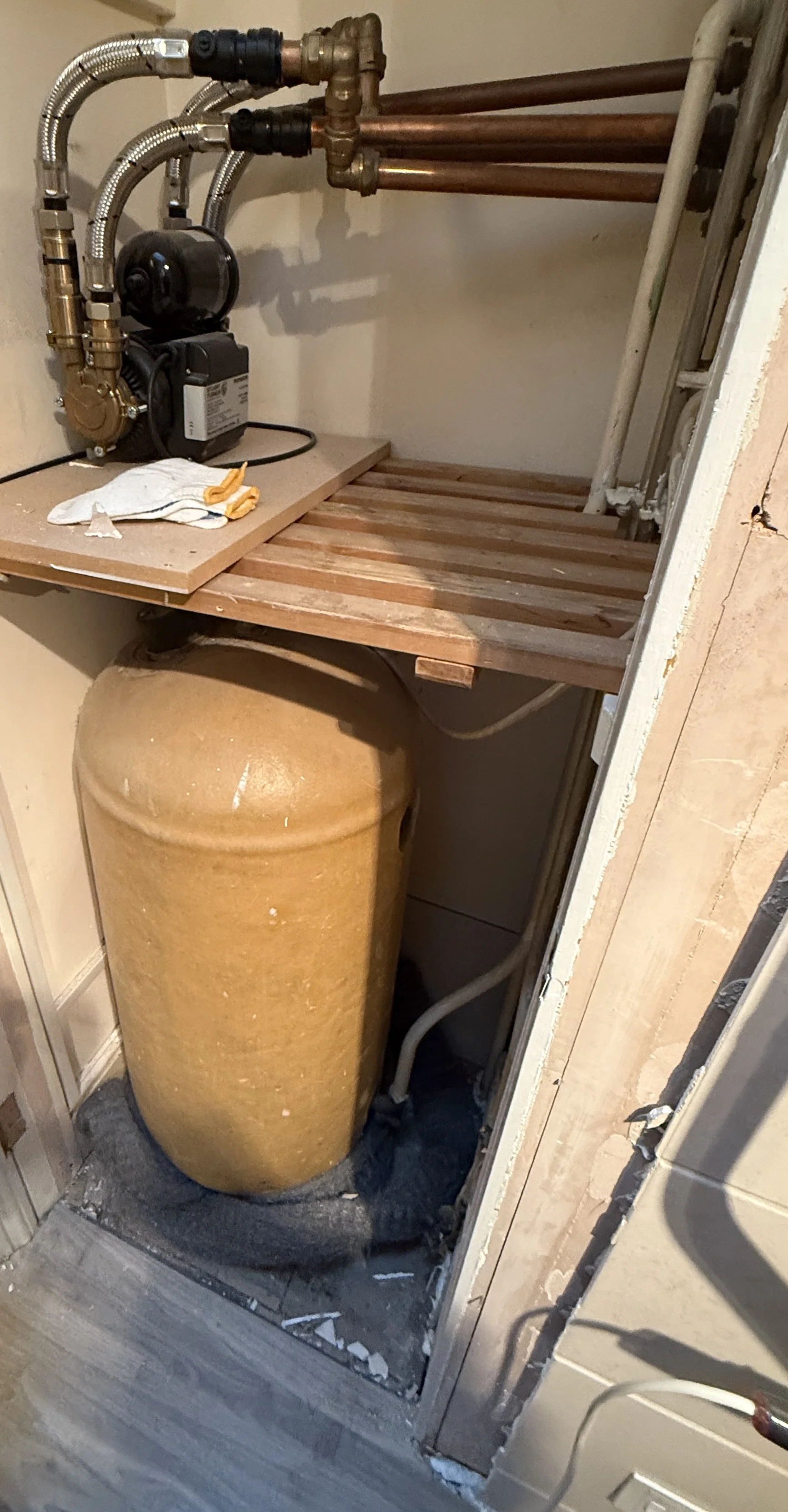 old-heating-tank-removal-london-flat.jpg
