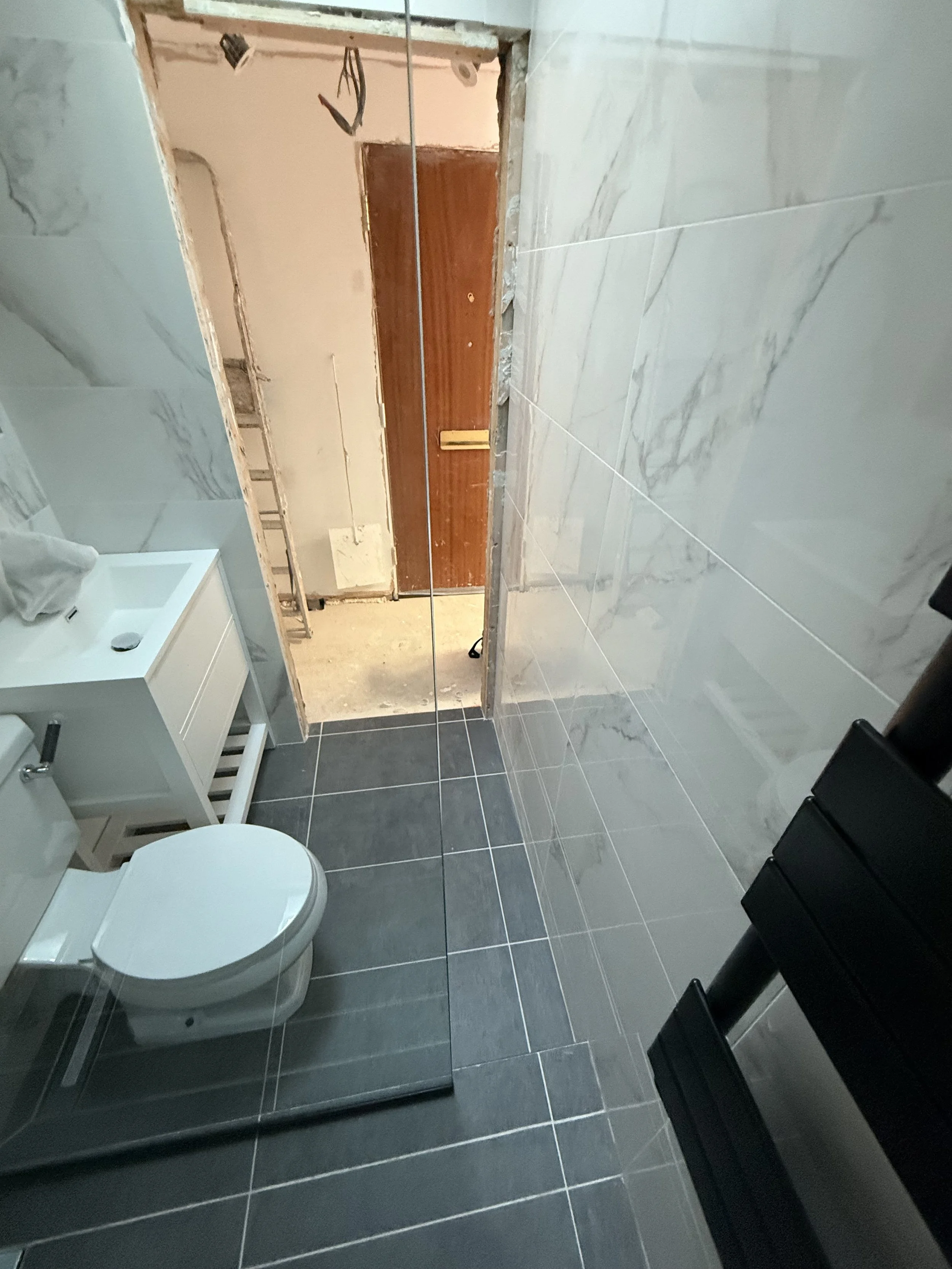 less than a foot to get out of the shower.jpeg