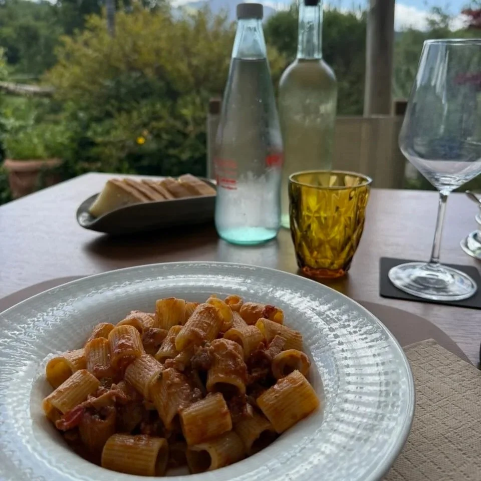 Bowl of Pasta on a table outside in Tuscany