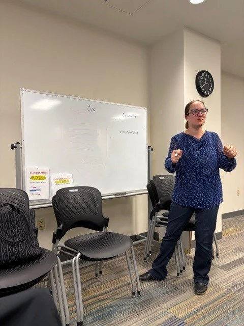 Jane in front of a whiteboard