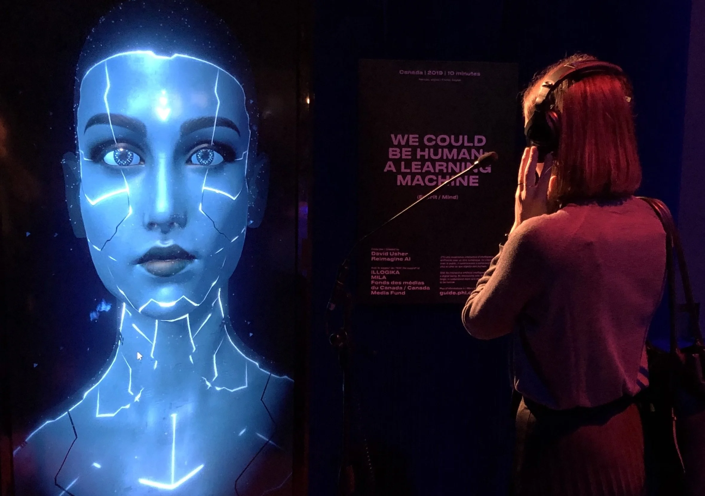 Ophelia AI Premiered at Phi Centre MontrealReimagine AI presented the exhibit We Could Be Human: an artificial intelligence interested in art, poetry, and what it means to be alive. It was also at the Museum of Human Rights. by Reimagine AI