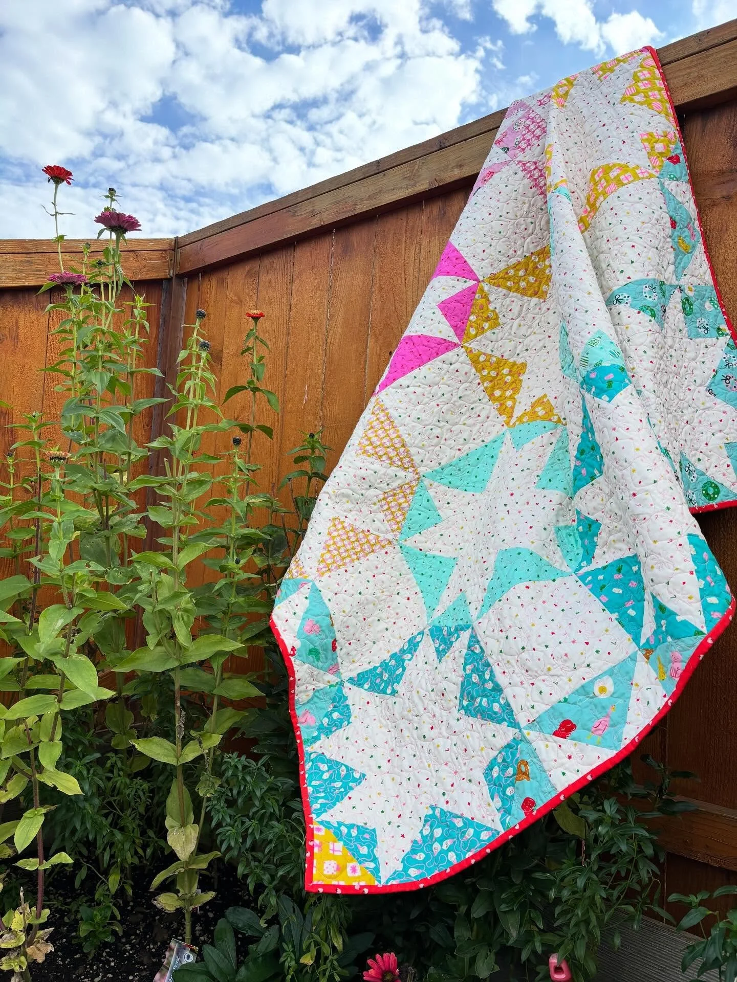 sitting in the carpool line and sharing pictures of my newest pattern, go and make🩵💛.