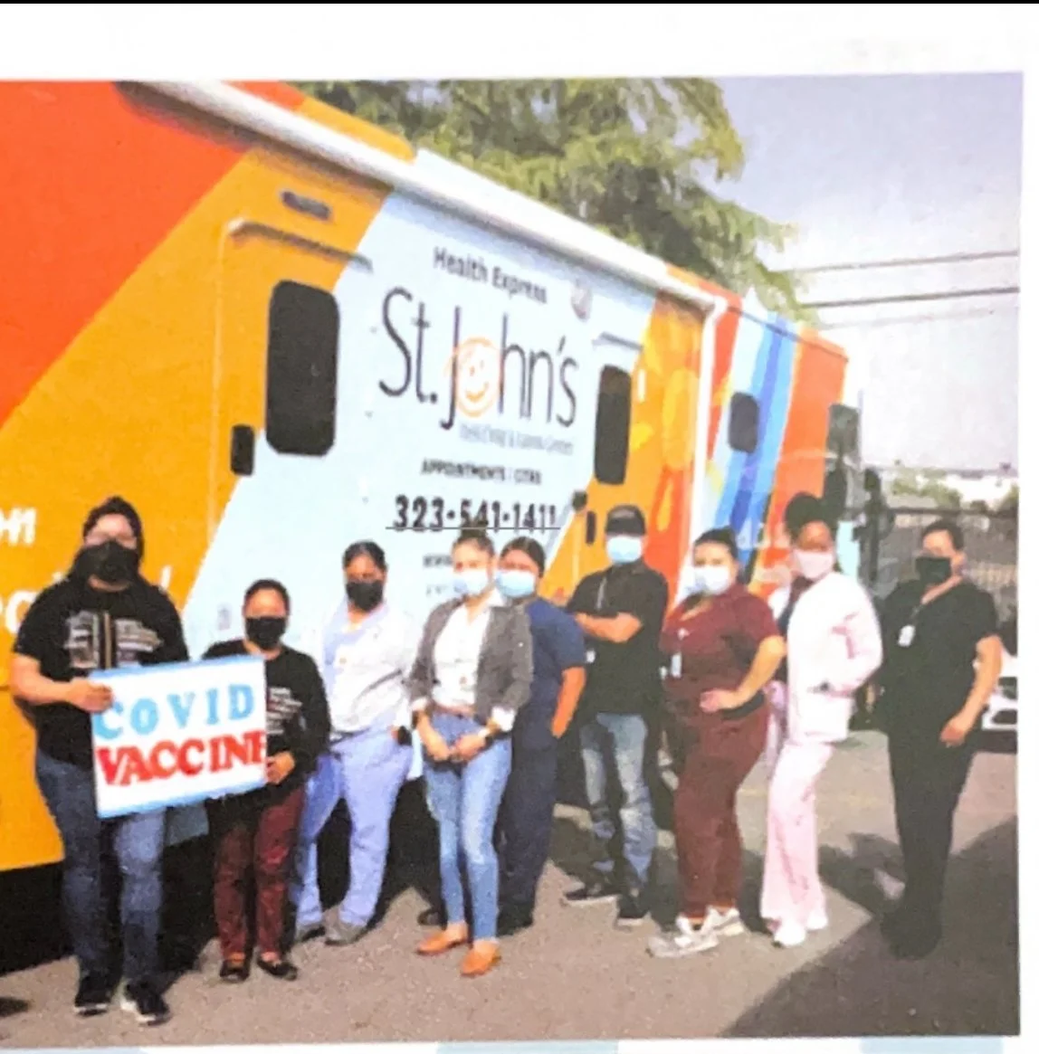 St. John's COVID vaccination truck outside Mercado la Paloma, 2021