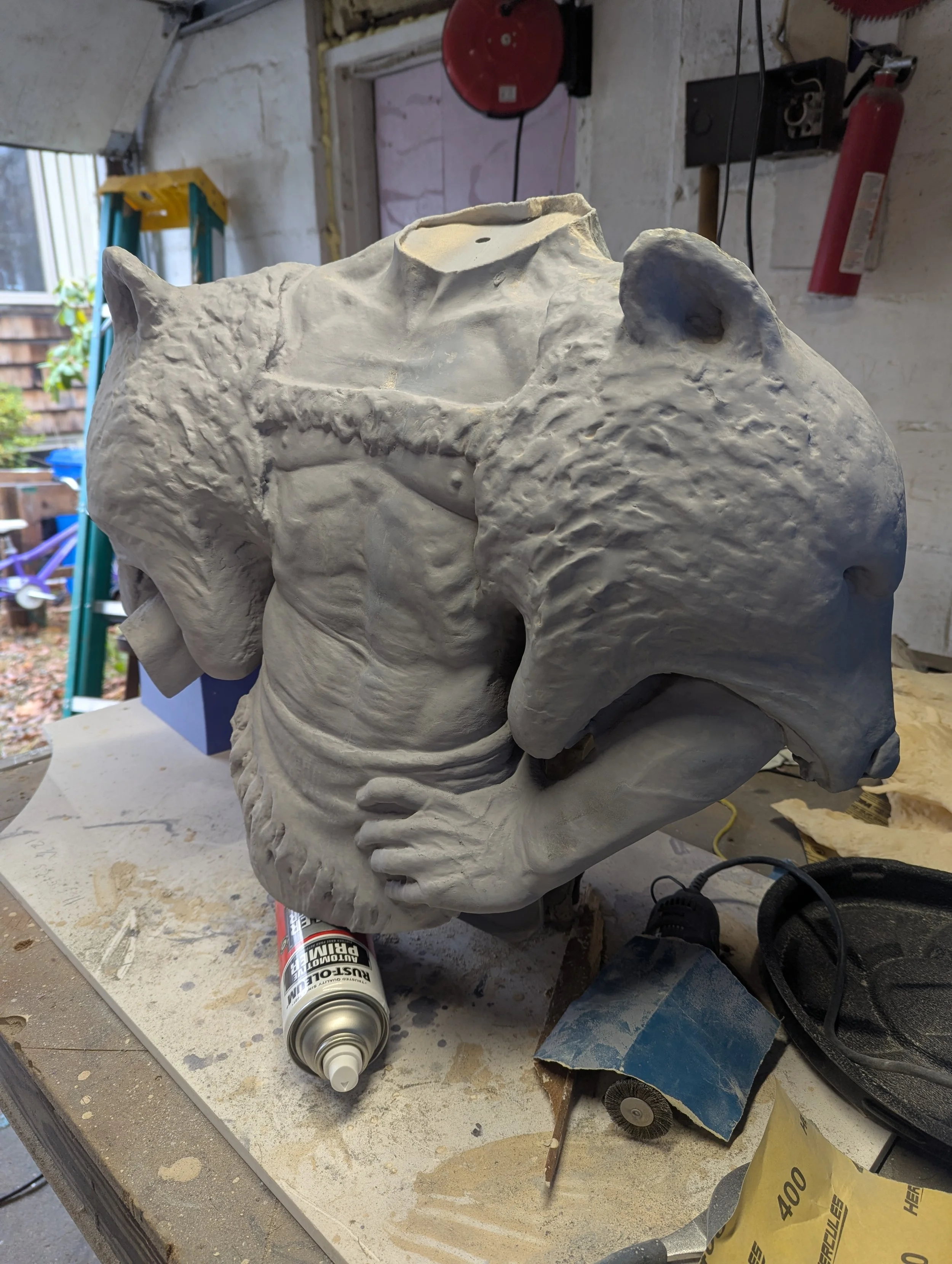Assembled sculptural torso pattern — surface preparation before the bronze stage.