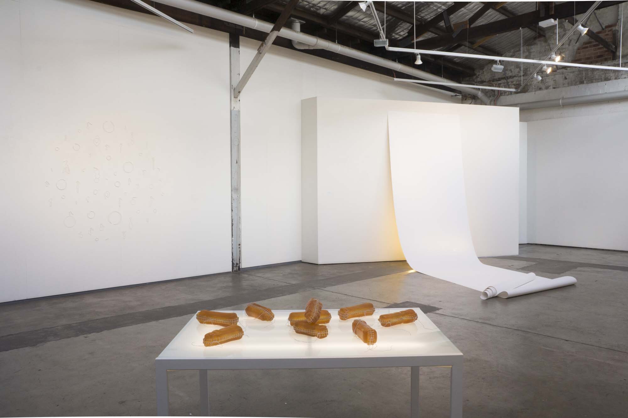 Niomi Sands, misplaced, 2016, soap, cotton, lights and table, variable. (installation view) Courtesy of the artist. Photographer Izabela Pluta