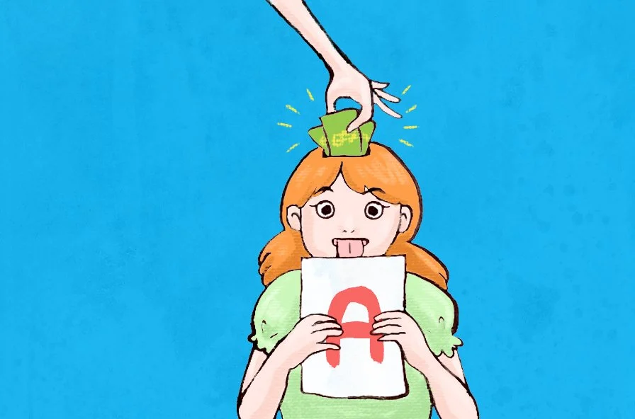 A cartoon girl with red hair sticking out her tongue, holding a paper with an 'A' on it, while a hand places money into her head.