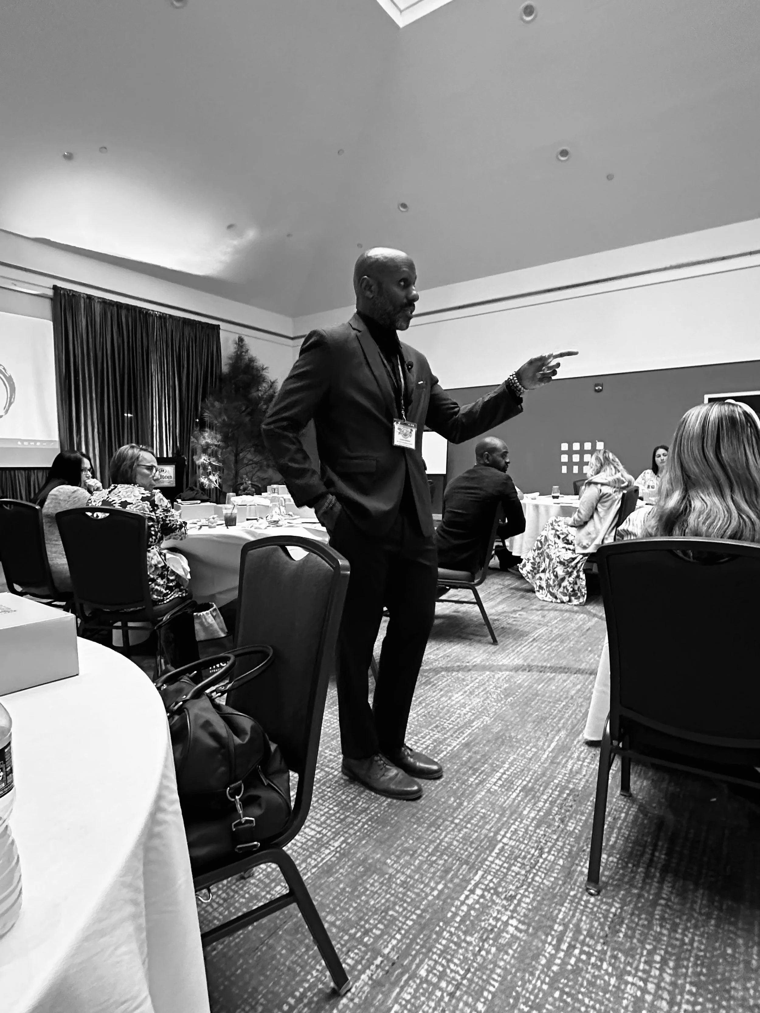 Executive coach Shawn Antonio delivering keynote on authentic leadership.