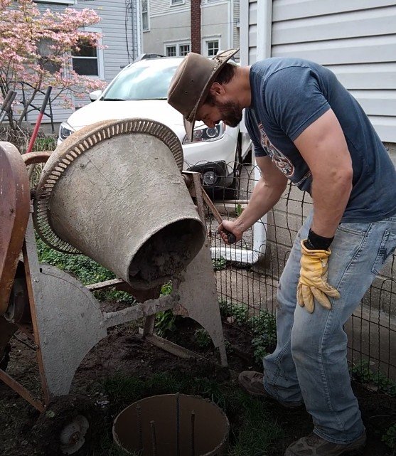 Brian working the cement mixer