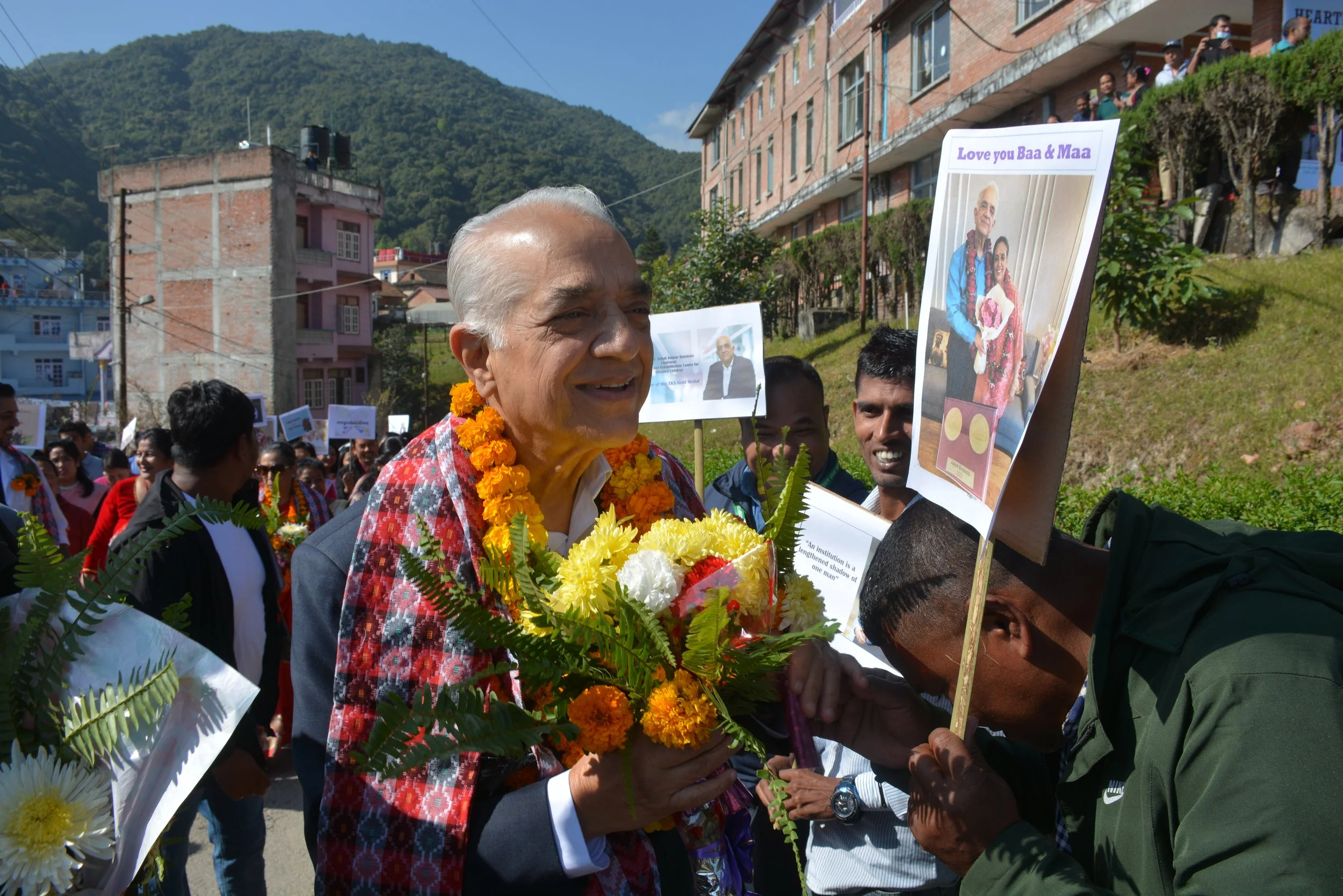 Dr Banskota greeting a well-wisher