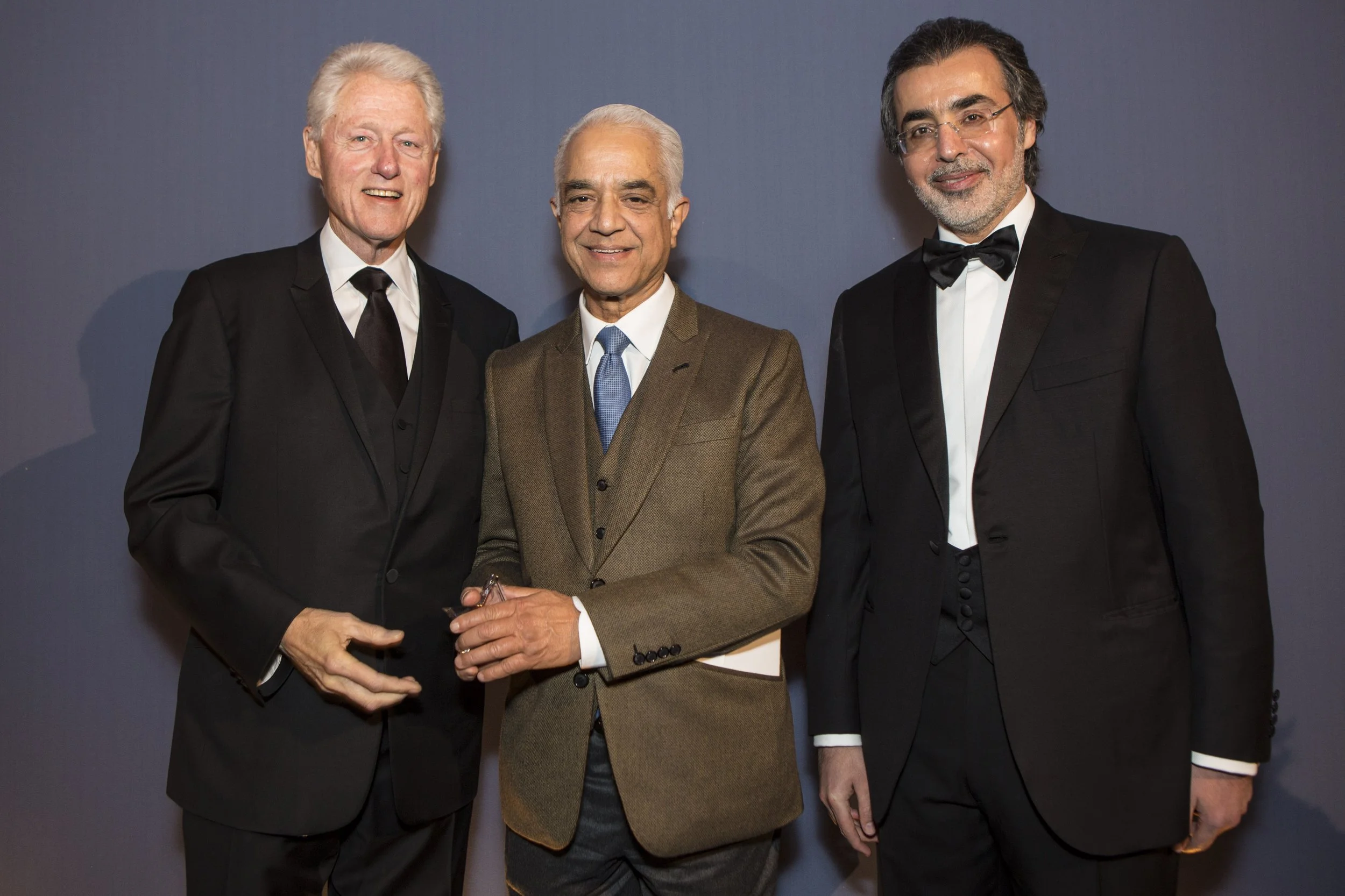 Dr Banskota receives the award from President Bill Clinton