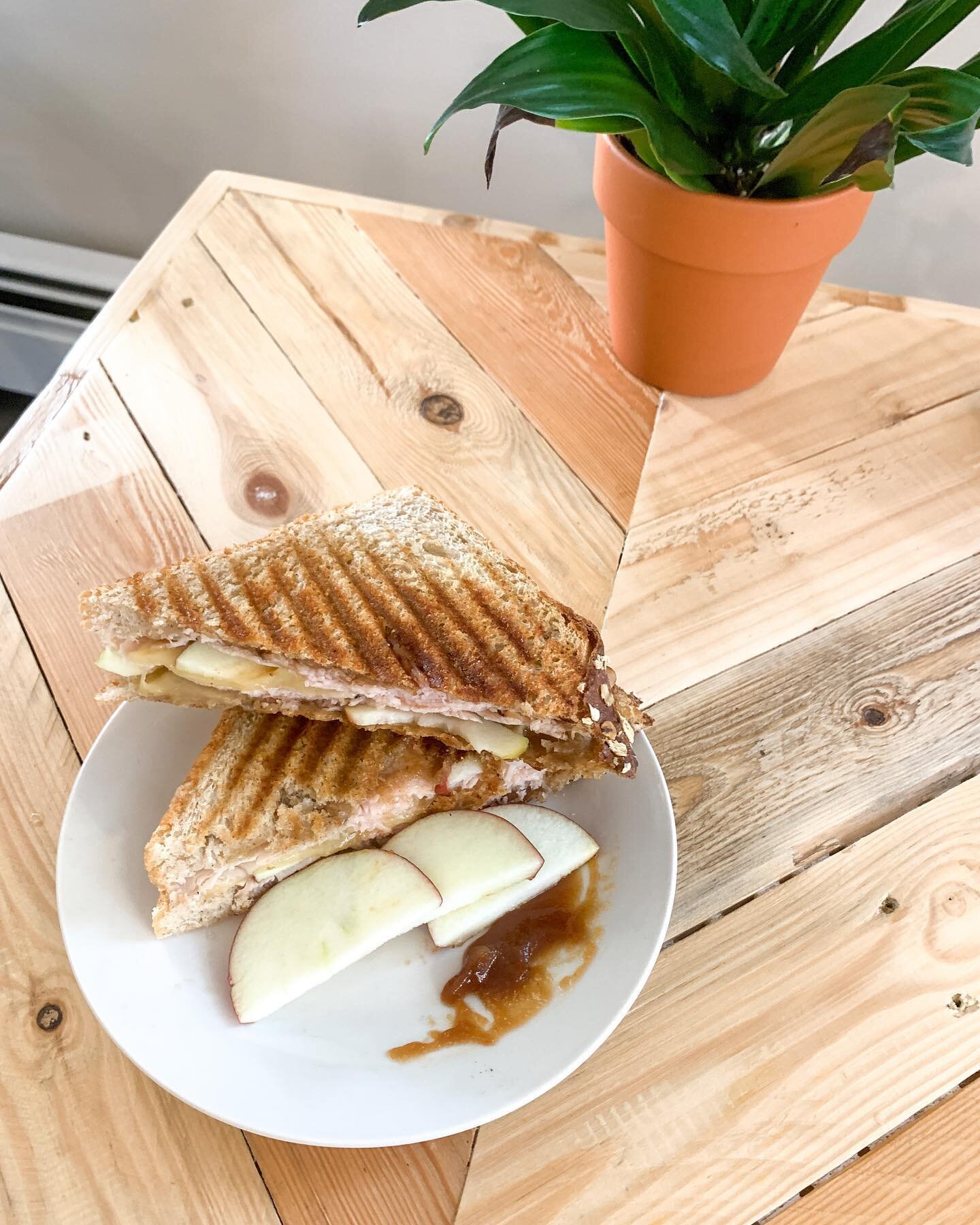 our favorite sandwich special is finally here!! The Turkey Apple Cheddar Panini is a MUST try!

Homemade apple butter spread, turkey, apple slices, and cheddar cheese towered high and grilled on honey oat bread 🍎