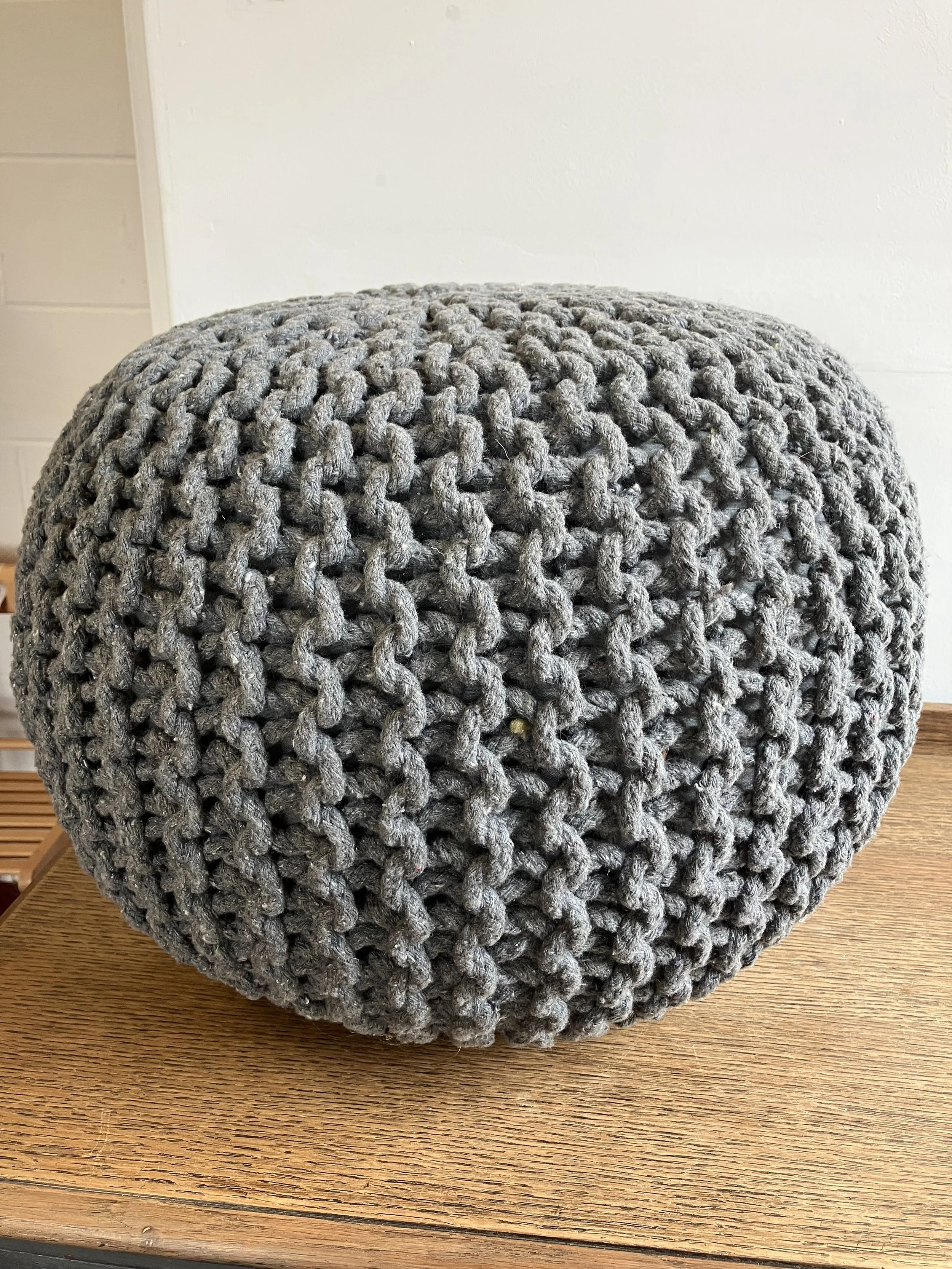 Round Grey Cotton Knitted Footstool / Pouffe by Snugcity