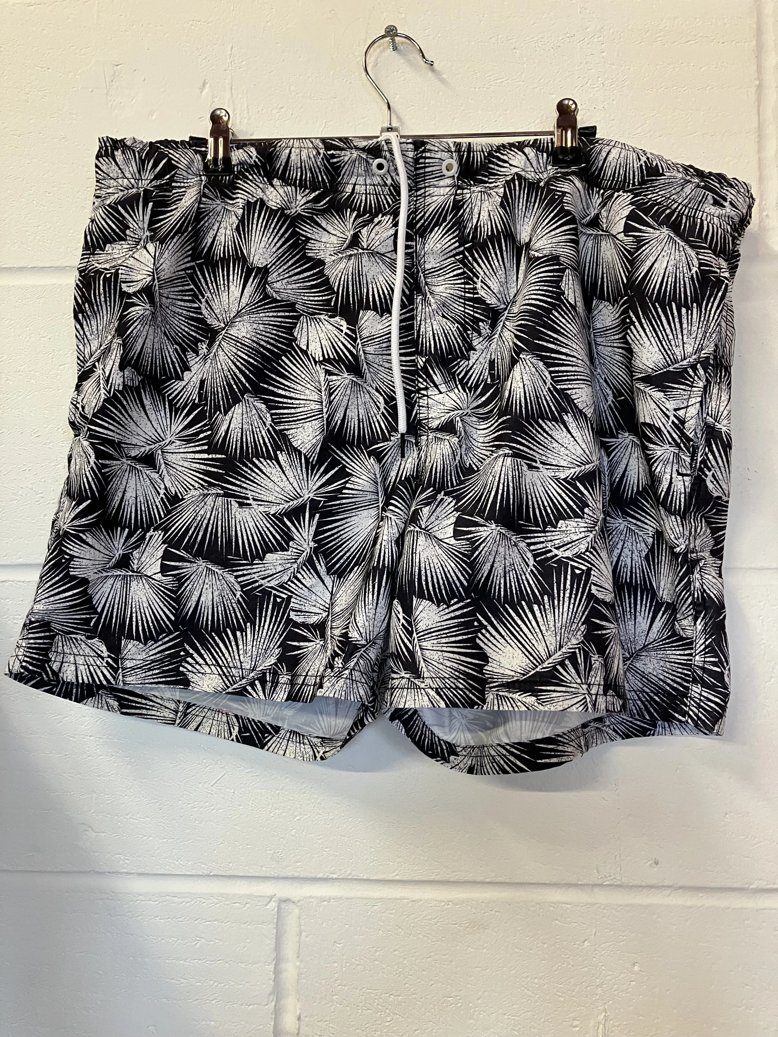 Pair of Black and White Leaf Pattern Men's Swimming Trunks by Next