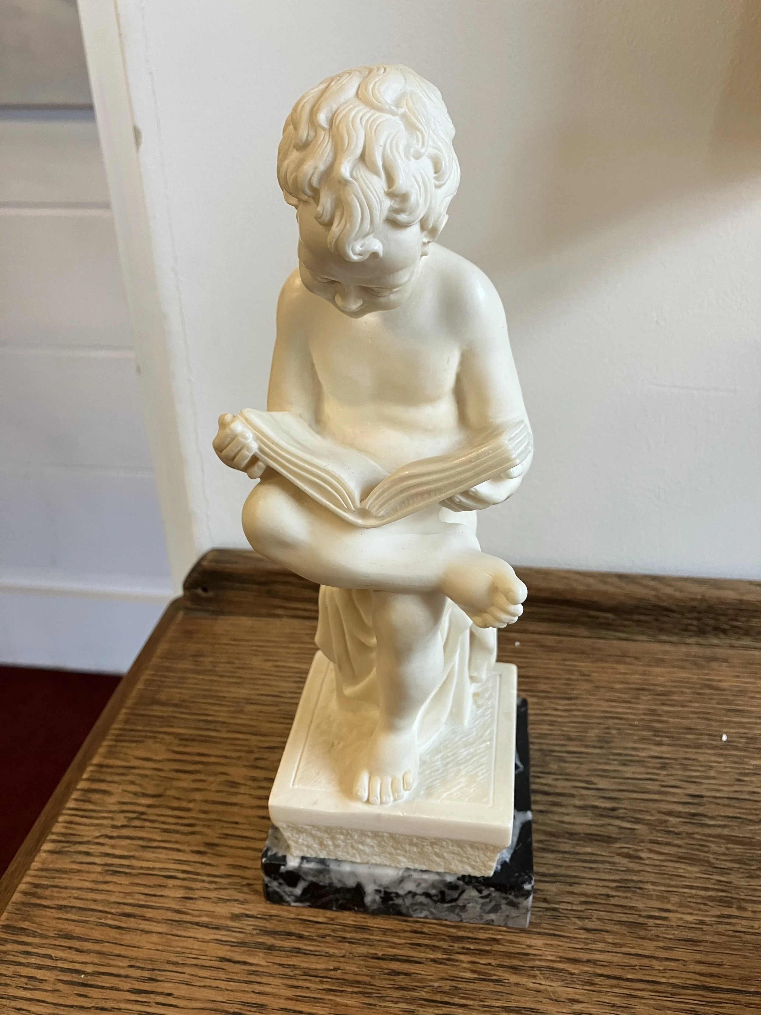 Resin Reproduction Statue of a Child Reading on Marble Base