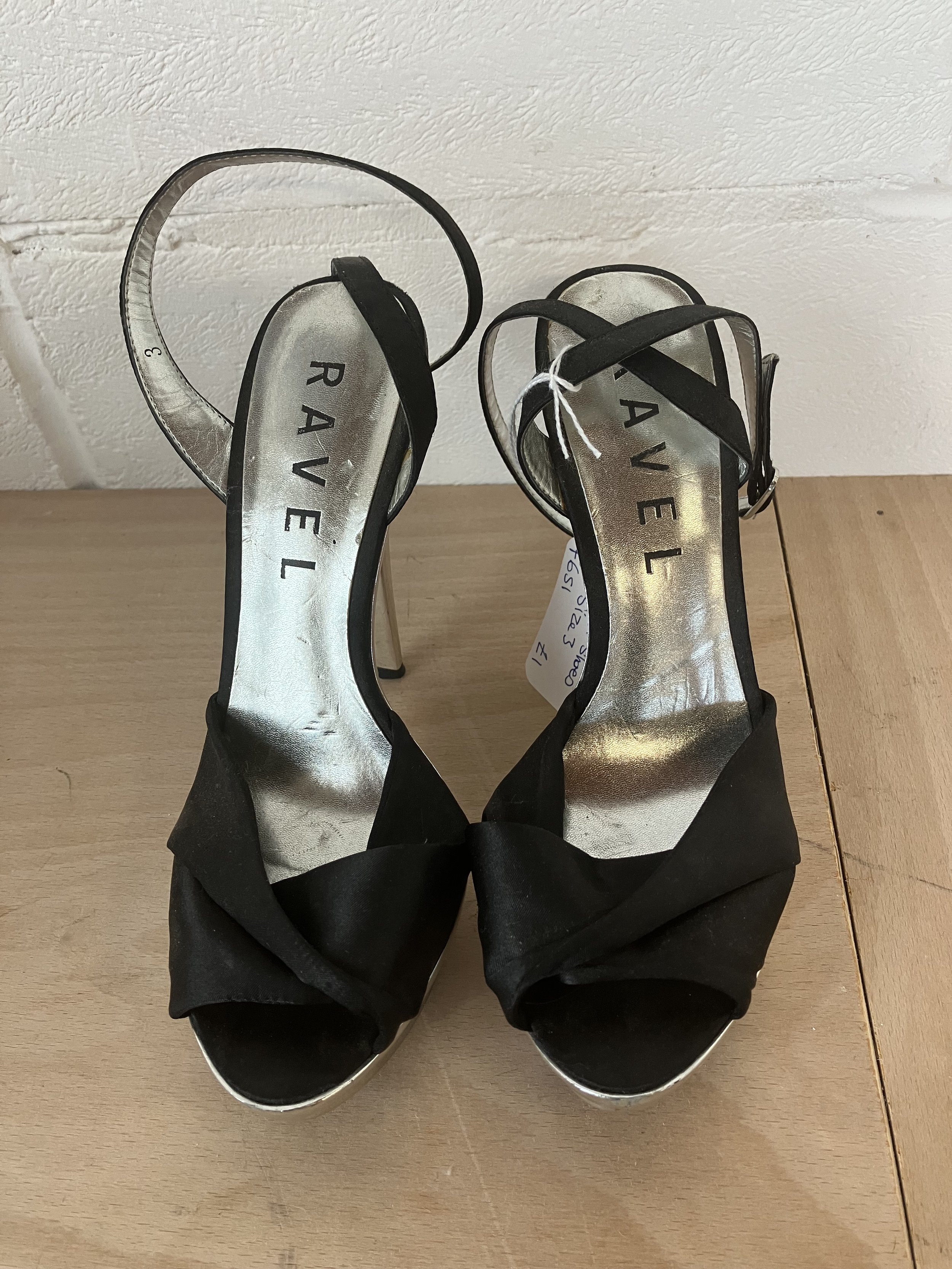 Pair of Black and Silver Heeled Shoes by Ravel