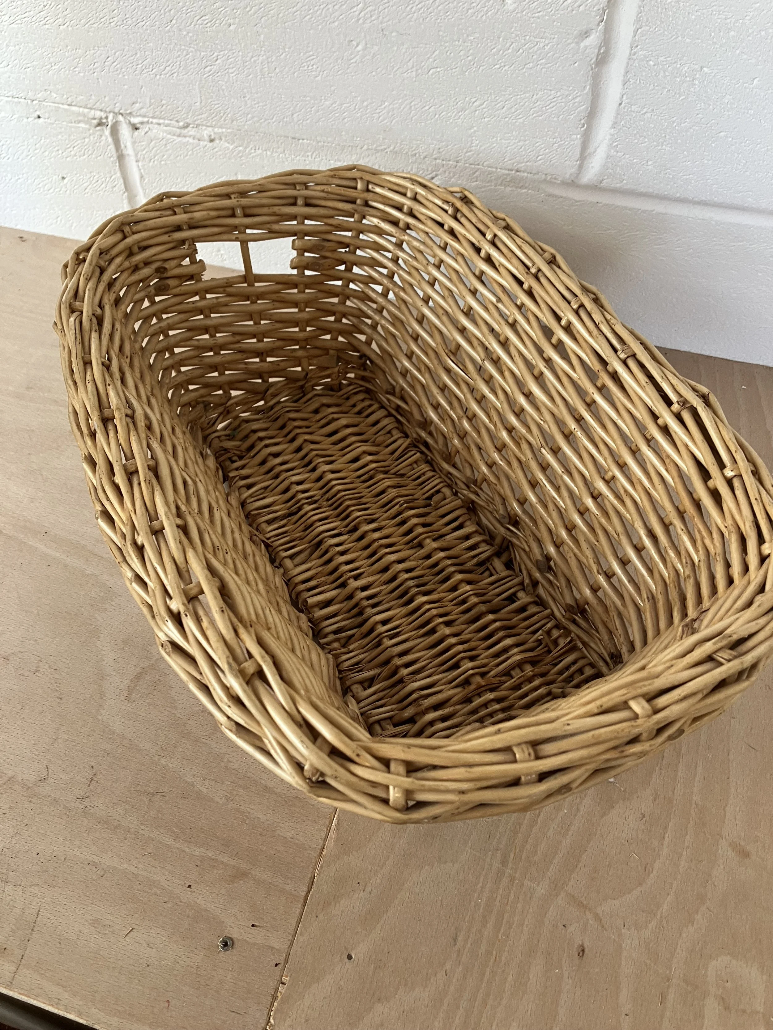 Small Oval Woven Wicker Basket with Integrated Handles
