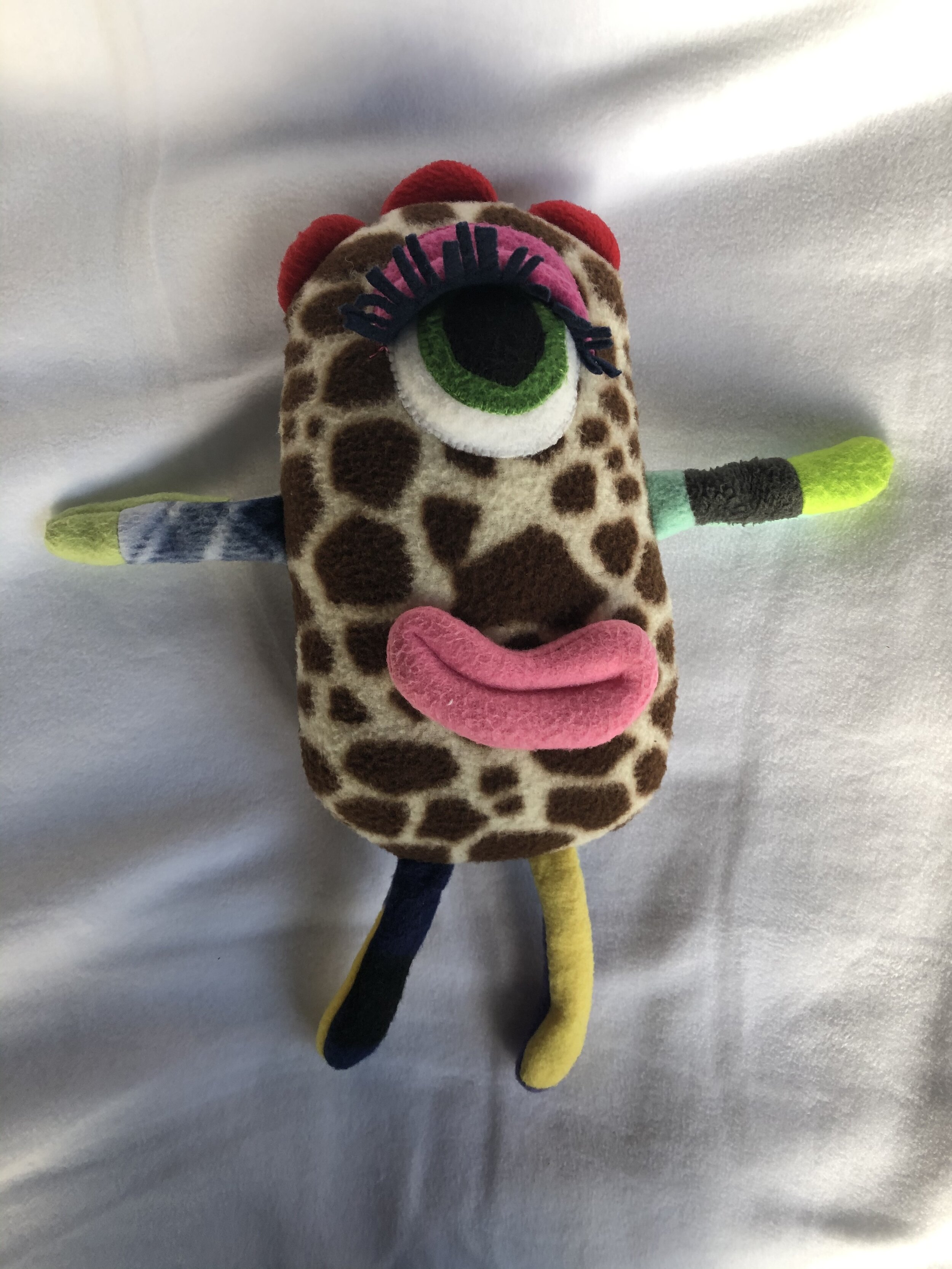 Olivia's Kloset donation monster doll.jpeg