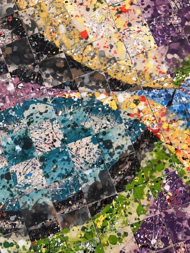 A close-up of the original canvas cut up and then reassembled (with every other piece turned over) and then glued to a new piece of canvas --- note the differentiation of the "wet" and "dry" pieces shown in the "every other piece" pattern.