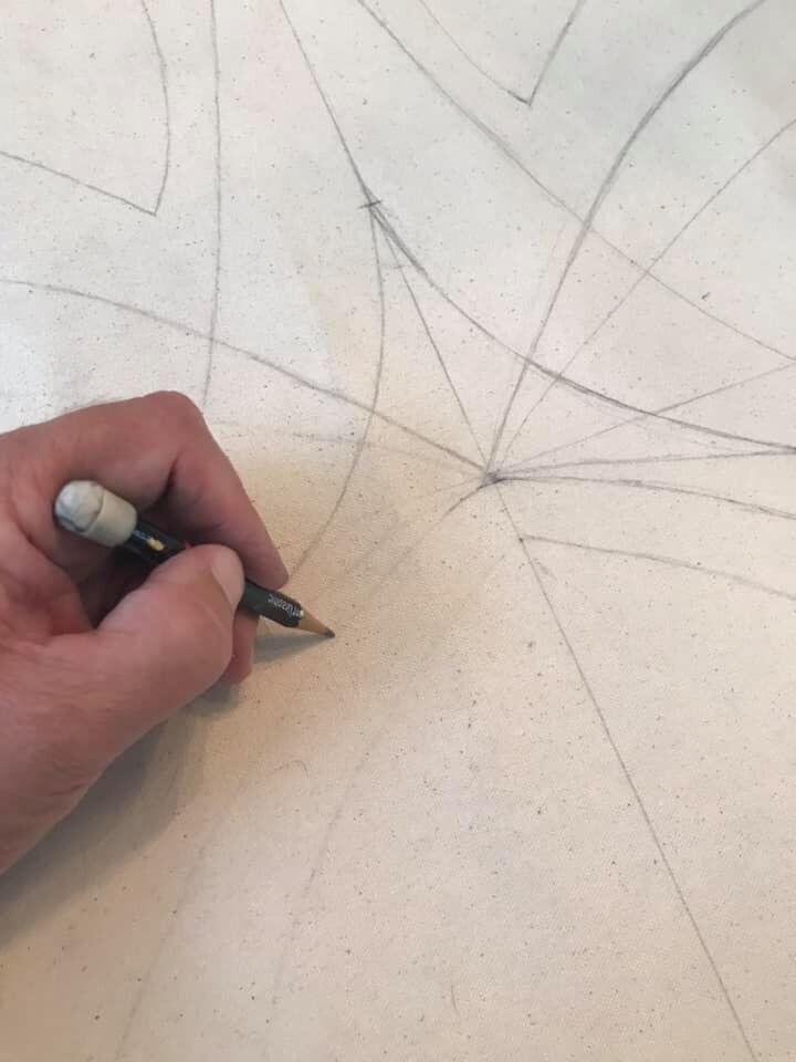 Transferring the design to the canvas.