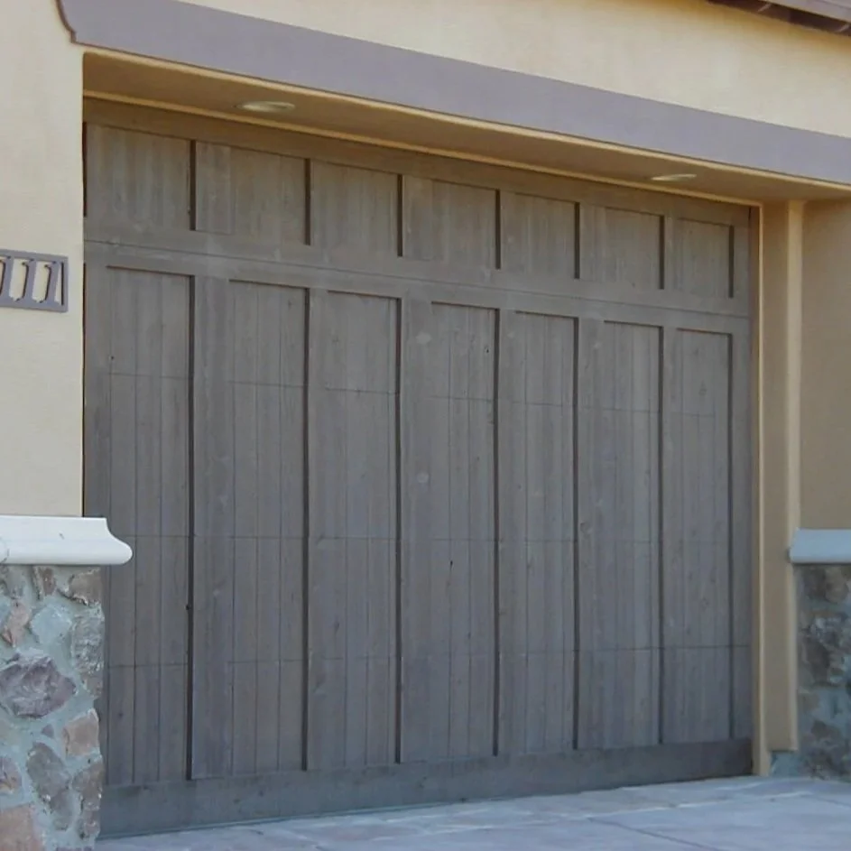 Damaged Garage Door Panels: Repair Options vs Full Replacement