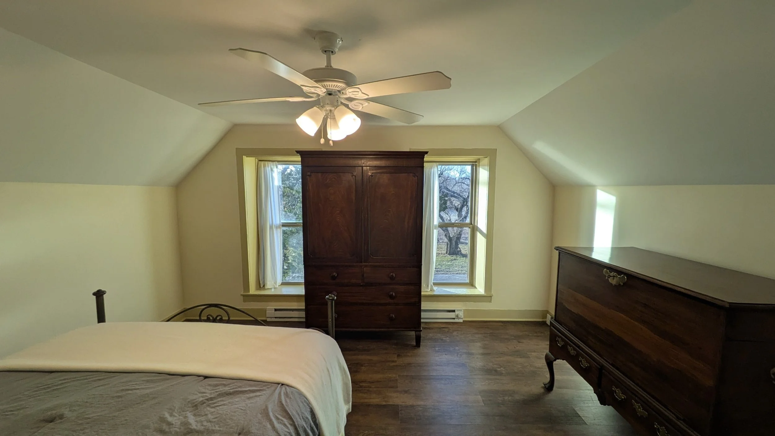 Photo of the southern upstairs bedroom from the doorway entrance.