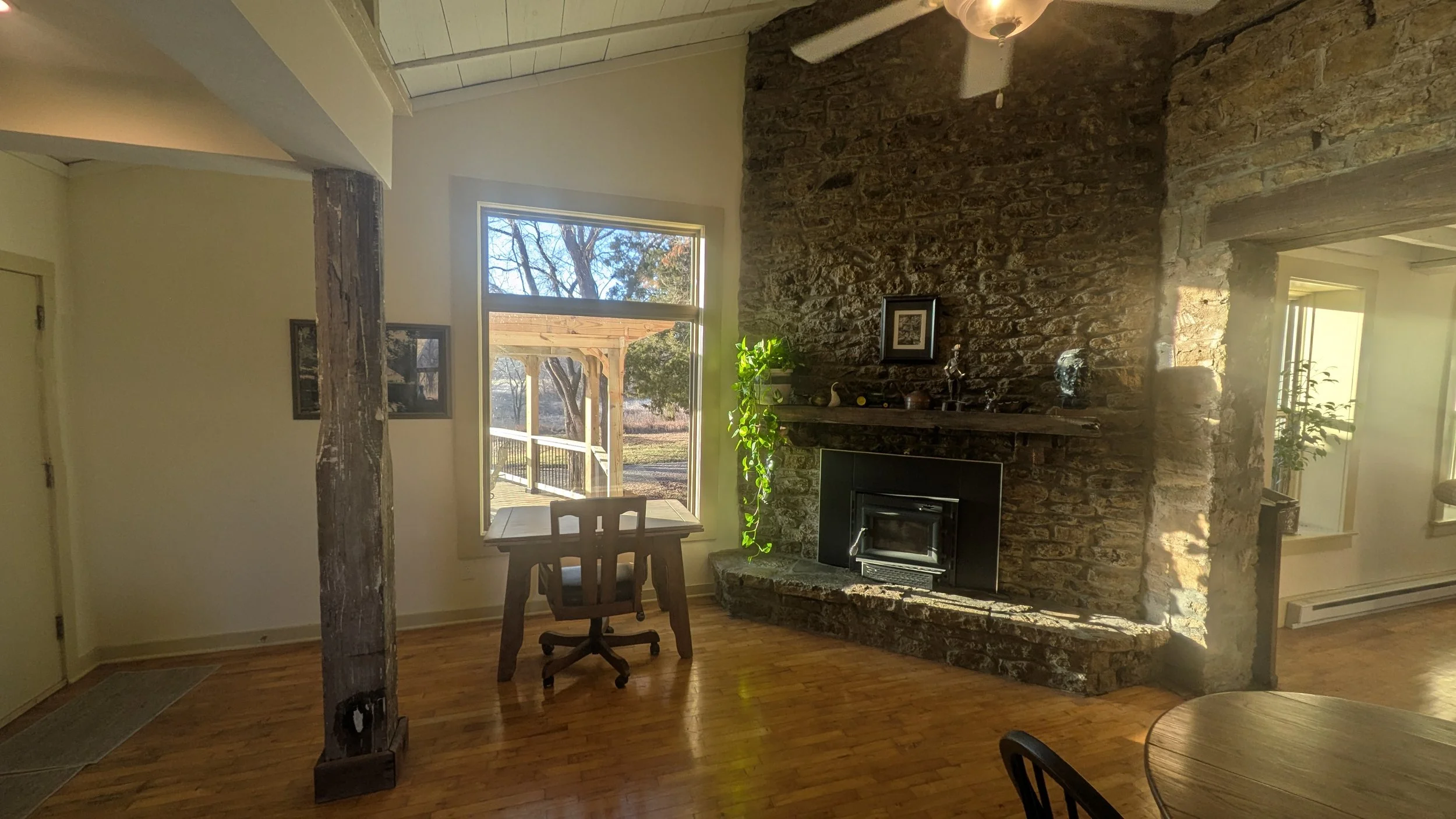 View of the fireplace located within the kitchen.