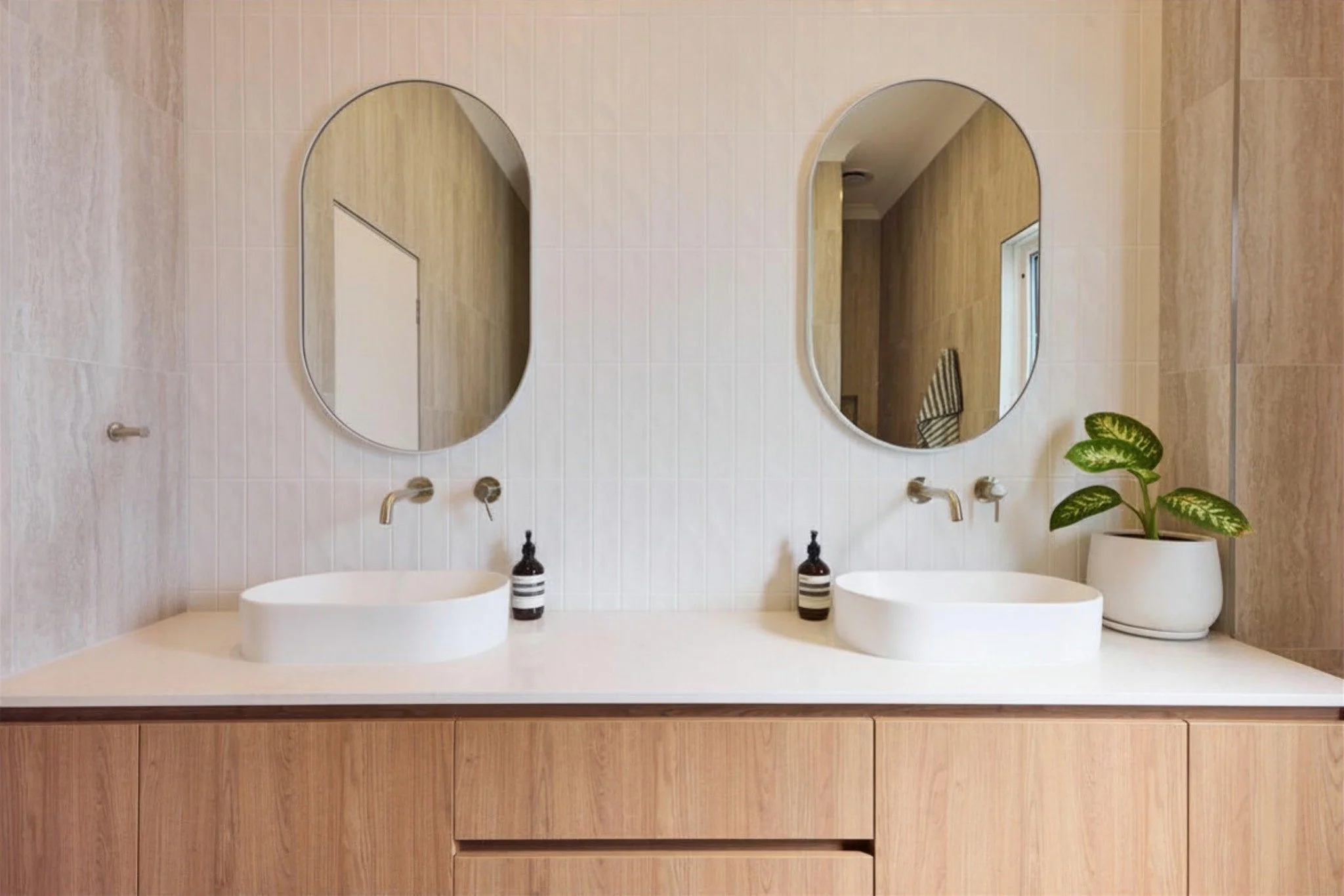 Timeless feel 🌿✨

Plumbing Fixtures - Reece Bathrooms 
Tiles - @tilesexpoperth 
Photos - Jessica Wyld Photography 
Building Design - @julieanncanal.designer 
Built by us 🔨

 #modernliving #DreamHome #mosmanpark #BathroomRenovation #perthrenovation 