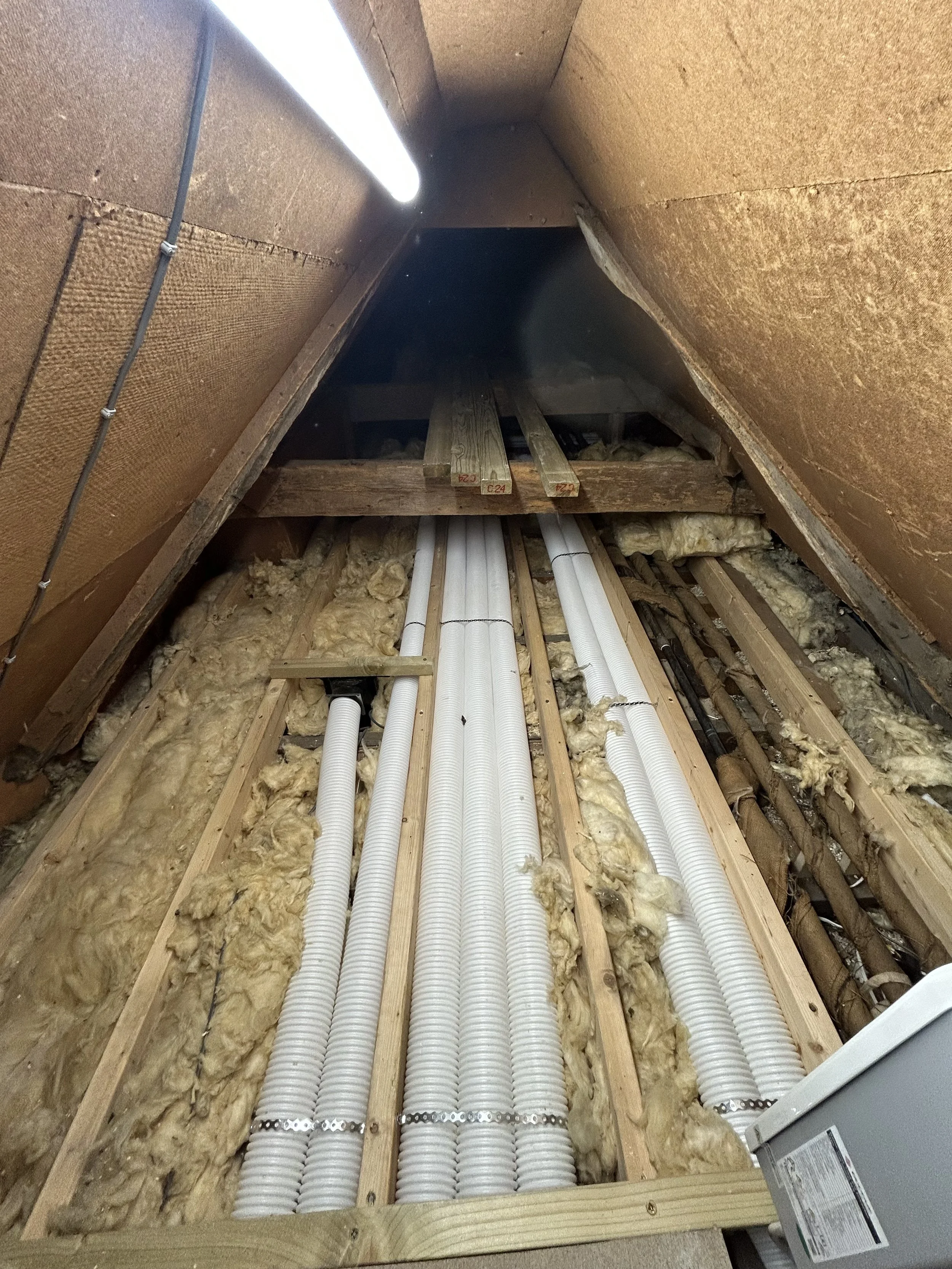 MVHR pipes under installation.jpg