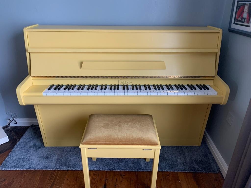Modern 3 pedal 88 note piano painted in “babouche” yellow installed in customers house - sold