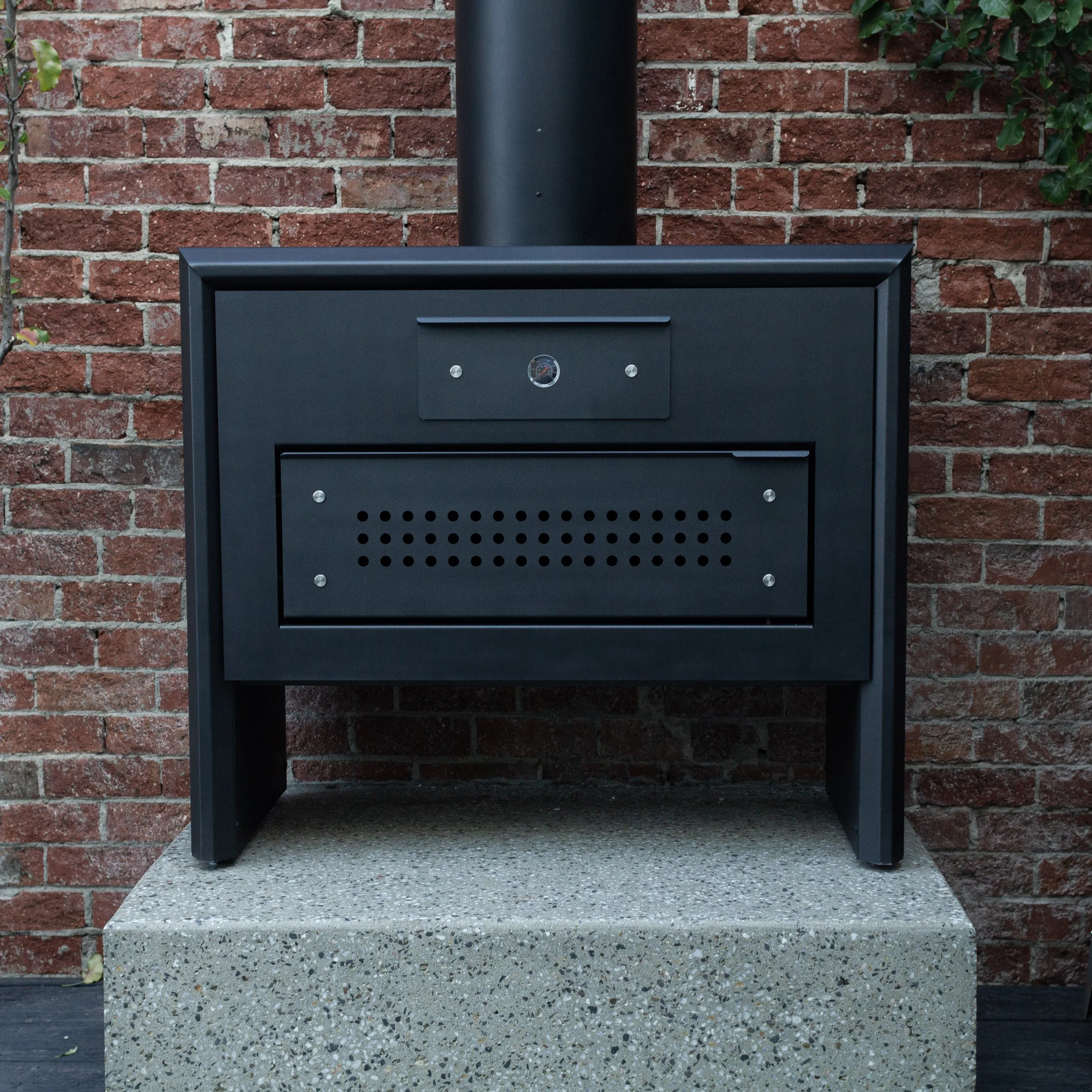 Why your outdoor kitchen needs an open fire cooker