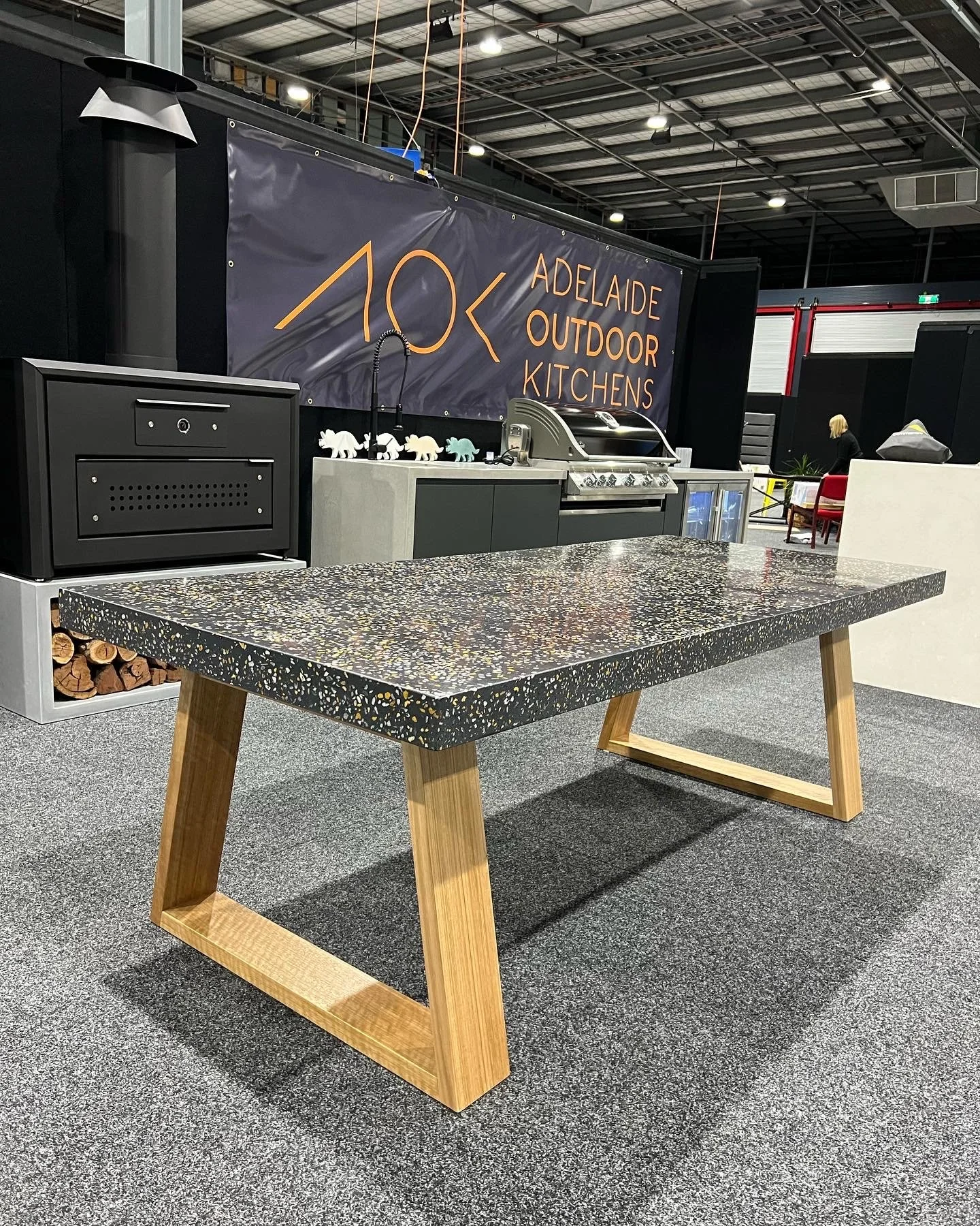Adelaide Outdoor Kitchen donates premium terrazzo timber table to fund cancer research for the Hospital Research Foundation Group