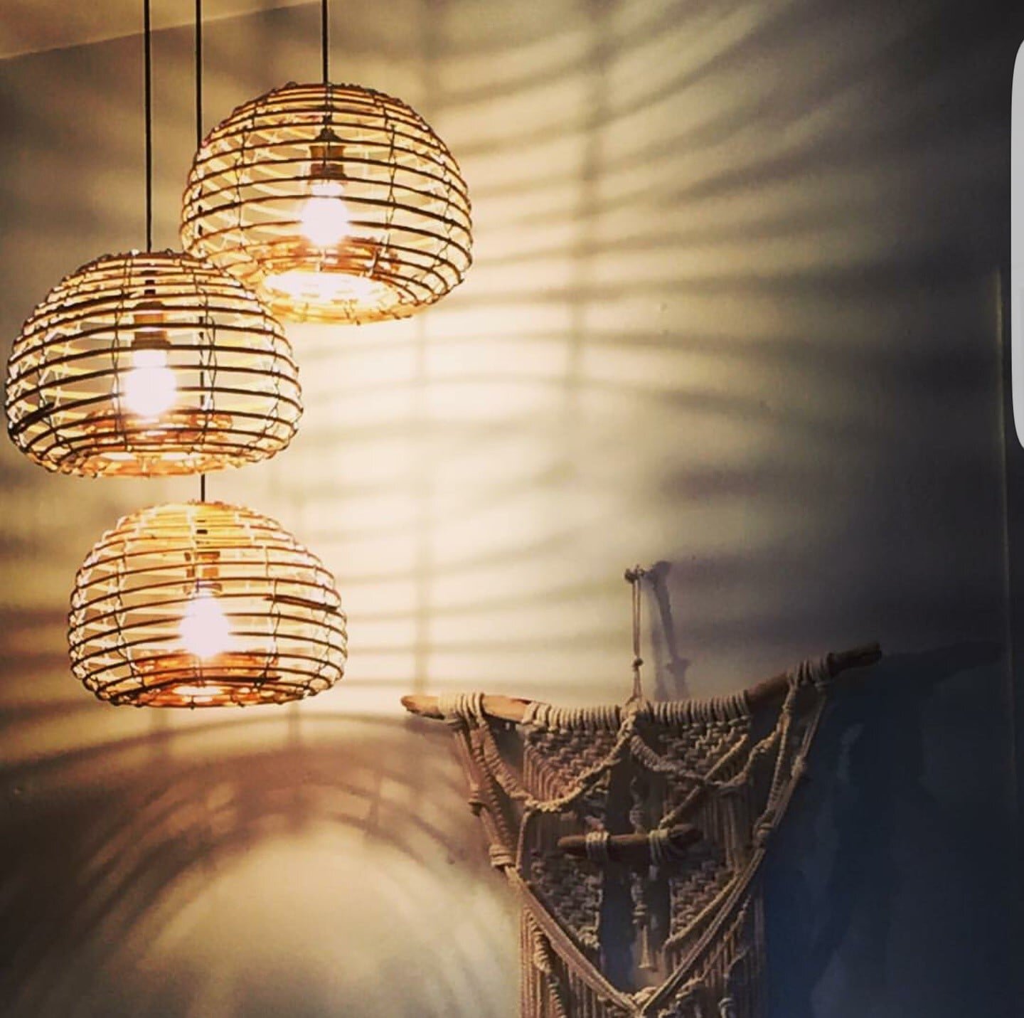 Standard size Lobster pot lighting. Cane and steel, reversed with the neck at the bottom.