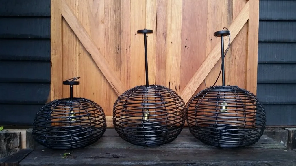 Black satin pendant lights, shown with hanging rods and ceiling plate. Many different sizes available.