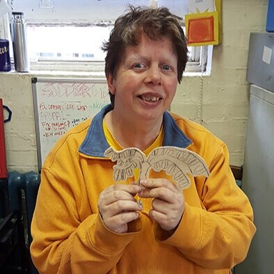 TRACEY  Tracey has a quick sense of humour and a very caring and considerate member of the team. She loves teaching the Corporate Volunteers how to use the machinery.