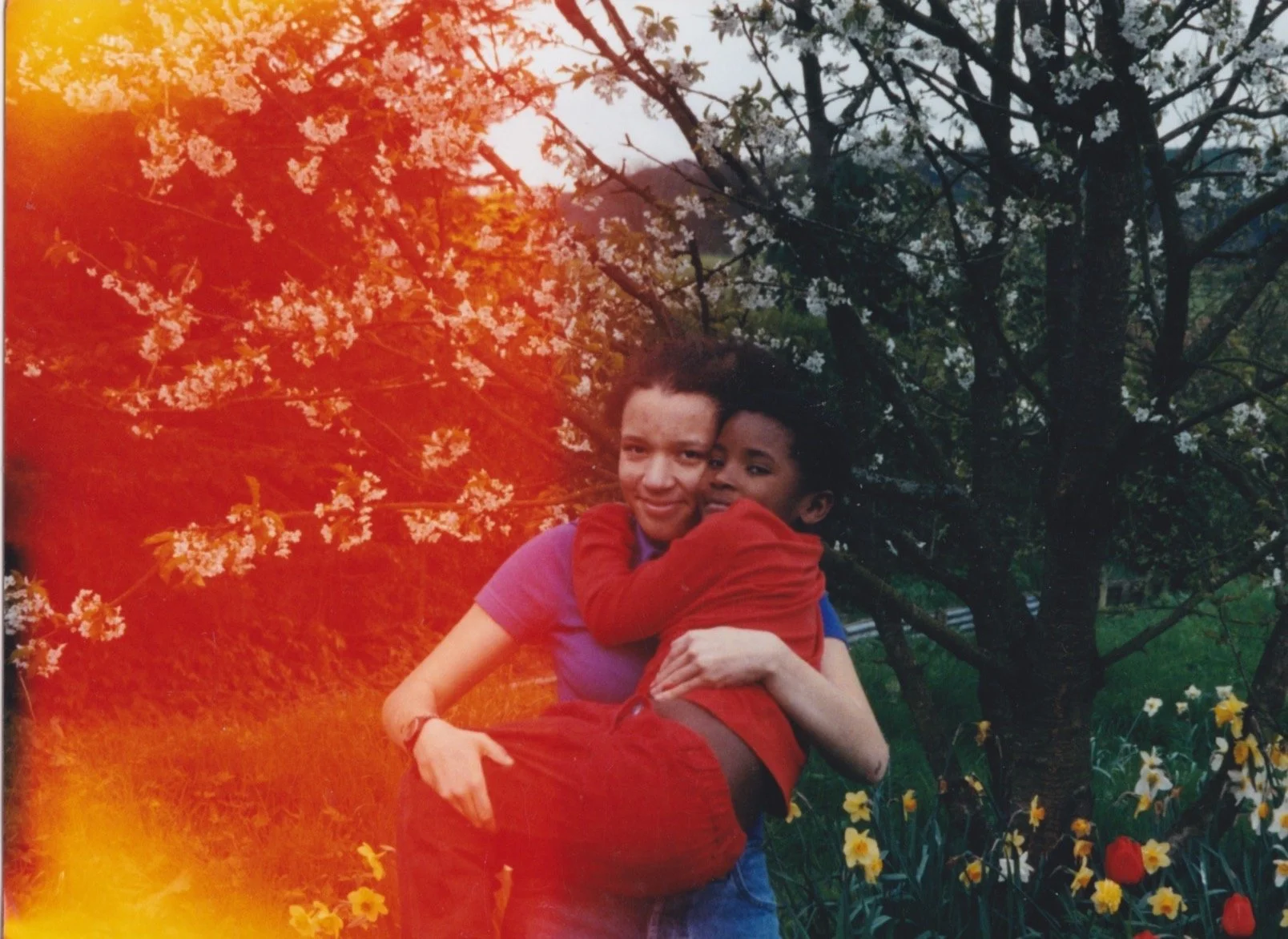 Beldina with her sister Leah, both children