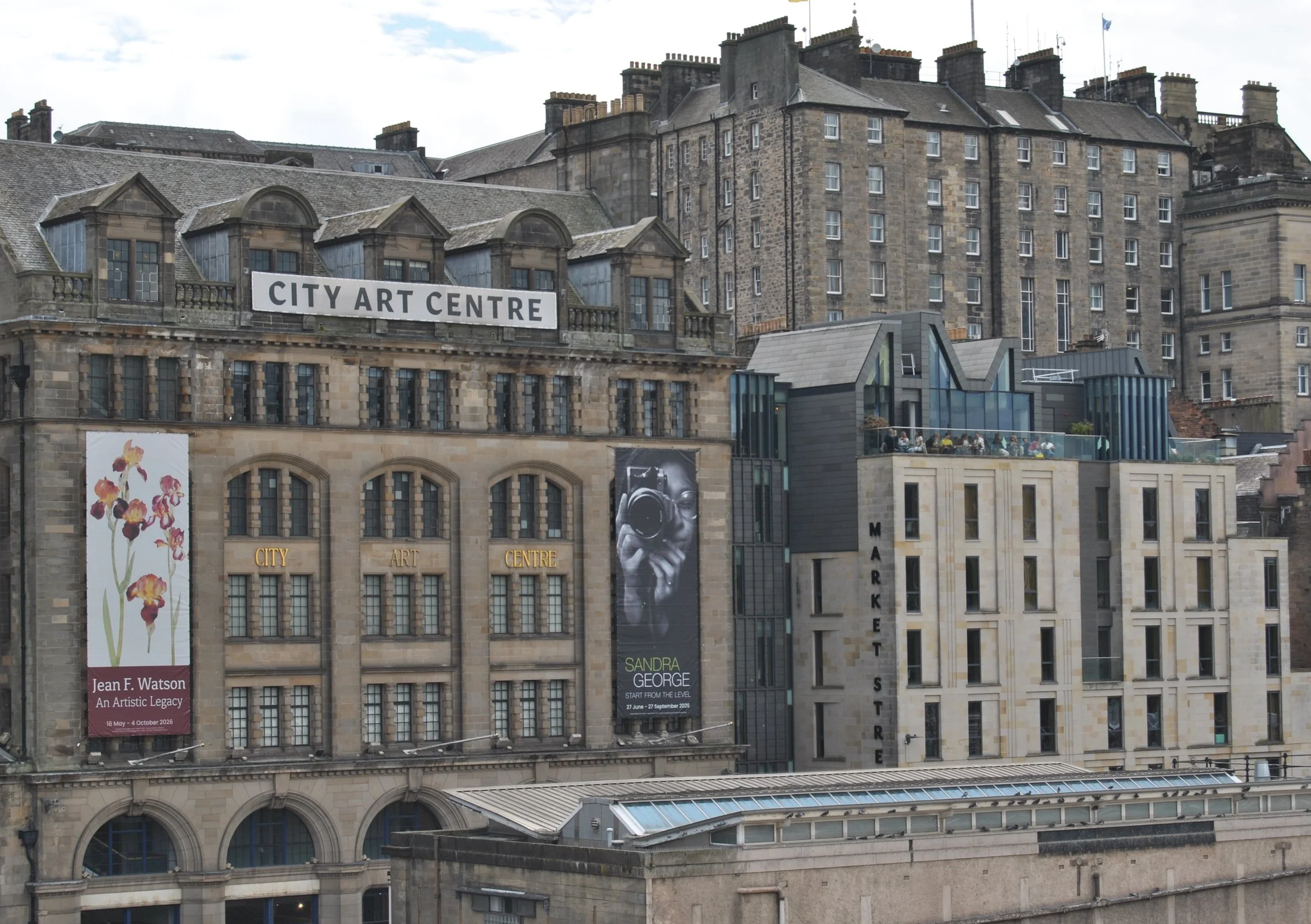 Sandra George’s exhibition advertised on the side of the City Art Centre